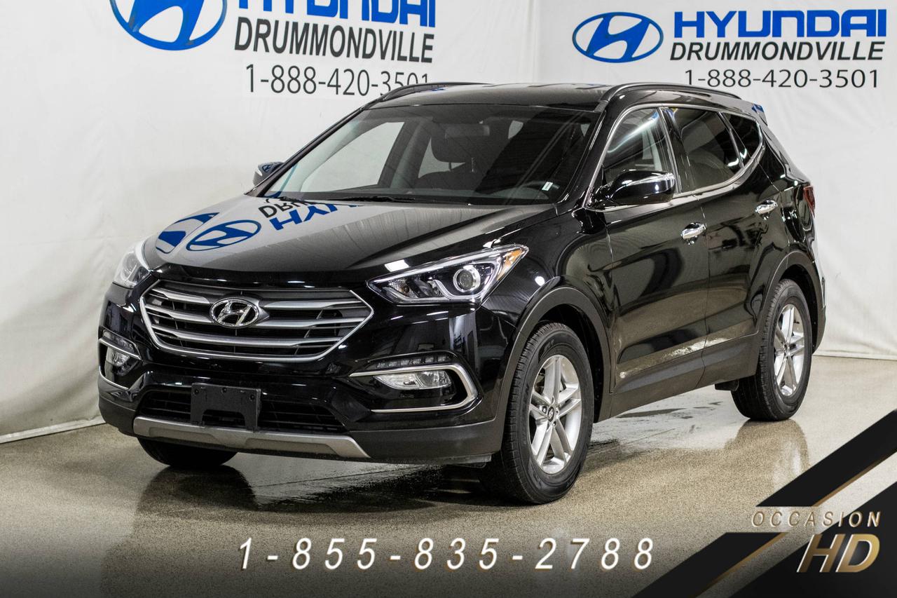 <a href=https://www.hyundaidrummondville.com/occasion/Hyundai-Santa_Fe_Sport-2018.html>https://www.hyundaidrummondville.com/occasion/Hyundai-Santa_Fe_Sport-2018.html</a>

***PROMO DÉMO*** LOCATION COURT TERME ~ GARANTIE + JAMAIS ACCIDENTÉ / SANTA FE SPORT 2018 2.4L PREMIUM AWD CAMÉRA DE RECUL, DÉTECTEUR D ANGLE MORT, VOLANT CHAUFFANT, SIÈGES CHAUFFANTS AV/ARR, CLIMATISATION 2 ZONES, BLUETOOTH, PHARES ANTIBROUILLARDS, MAGS 17 POUCES, ÉCRAN TACTILE ET BIEN PLUS !! CE ROBUSTE VUS POSSÈDE UN MOTEUR FORT INTÉRESSANT À LA FOIS PUISSANT ET ÉCONOMIQUE !! IL EST APPRÉCIÉ POUR SA COMMODITÉ, SON HABITACLE TRÈS BIEN ÉQUIPÉ OFFRANT UNE GRANDE ESPACE CARGO, SA GARANTIE COMPLÈTE 5 ANS / 100 000 KM AINSI QUE SON DESIGN ÉLÉGANT ET SPORTIF !! LE VUS QUI SADAPTE À VOTRE STYLE DE VIE !! PASSEZ DÈS AUJOURDHUI POUR EN FAIRE LESSAI ROUTIER !!

POUR PRENDRE RENDEZ-VOUS POUR UN ESSAI ROUTIER OU POUR OBTENIR PLUS DE DÉTAILS, VOUS POUVEZ COMMUNIQUER SANS FRAIS AU : 1-888-420-3501, VIA MESSAGERIE TEXTE OU APPEL AU 819 314-6555 OU PAR COURRIEL AU USAGE@HYUNDAIDRUMMONDVILLE.CA EN TOUT TEMPS MÊME LES SOIRS ET LES FINS DE SEMAINE !! PRIX ÉTABLI AVEC UN FINANCEMENT À TAUX RÉGULIER !!

NOUS SOMMES LA CONCESSION AU CENTRE DU QUÉBEC !! 1H DE MONTRÉAL   1H DE SHERBROOKE   1H DE TROIS-RIVIÈRES   1H45 DE QUÉBEC !! LE VÉHICULE QUE VOUS RECHERCHEZ À PORTÉ DE MAIN !!

1ERE, 2E ET 3E CHANCE AU CRÉDIT !! AUCUN CAS REFUSÉ !!
FINANCEMENT ET GARANTIE DISPONIBLE SUR PLACE !!
NOUS REPRENONS TOUS VOS ÉCHANGES, MOTO - VTT - BATEAU - ROULOTTE - MOTORISÉ - AVION   QUADRIPORTEUR !!