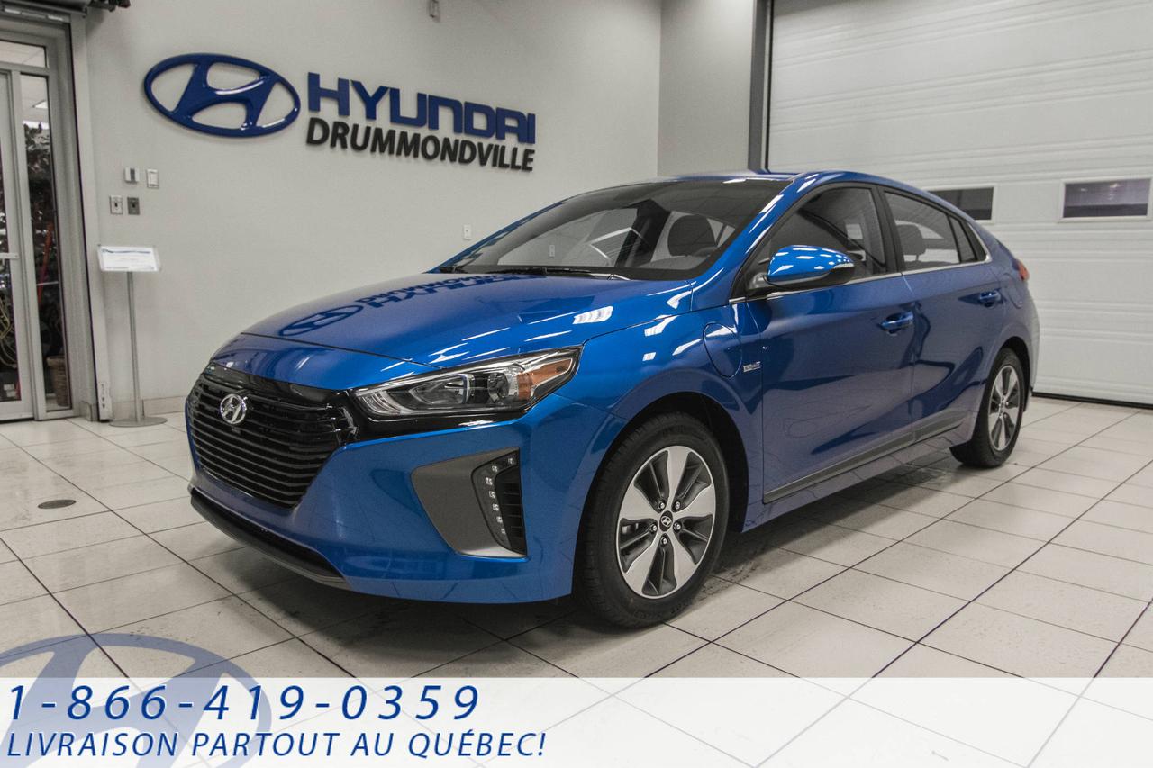 <a href=https://www.hyundaidrummondville.com/occasion/Hyundai-Ioniq-2018.html>https://www.hyundaidrummondville.com/occasion/Hyundai-Ioniq-2018.html</a>

HYUNDAI IONIQ 2018 PHEV + WOW!!

***LIONIQ électrique plus offre le meilleur des deux mondes. Cette hybride rechargeable novatrice peut parcourir jusqu à 47 kilomètres en mode strictement électrique, pour des trajets sans émissions polluantes. Besoin d une plus grande autonomie? Pas de problème   une fois l autonomie en mode électrique épuisée, l IONIQ électrique plus fonctionne comme une hybride traditionnelle, pour vous permettre de parcourir jusqu à 1 000 kilomètres avec un seul plein de carburant***
*	Chaine audio de luxe InfinityMD AM/FM/SiriusXMMC/MP3 avec 8 haut-parleurs*	Caméra de recul avec lignes de guidage dynamiques
	Sièges avant chauffants*	Phares de jour à DEL, feux arrière à DEL et clignotants à DEL aux rétroviseurs

PERFORMANCE
+ Moteur de 1,6 L à injection directe dessence + moteur électrique synchrone intégré à aimants permanents de 45 kW + batterie haute tension au lithium-ion polymère de 8,9 kWh
+ Boite EcoShift à 6 rapports à double embrayage
+ Système de freinage à récupération dénergie

SECURITÉ
+ 7 coussins gonflables (incl. coussin de genoux pour le conducteur)
+ Système de freinage antiblocage ABS, distribution électronique de la force de freinage et aide au freinage
+ Détecteur dobjet dans langle mort avec assistance au changement de voie et alerte de circulation transversale arrière
+ Gestion de la stabilité du véhicule, contrôle électronique de la stabilité avec antipatinage


CARACTÉRISTIQUE INTERIEUR
+ Chaine audio haut de gamme Infinity®AM/FM/SiriusXMMC/MP3 à 8 haut-parleurs
+ Système de navigation à écran tactile haute résolution de 8 po
+ Sièges arrière à dossiers rabattables divisés 60/40
+ Connectivité Apple CarPlayMC et Android AutoMC
+ Système téléphonique mains libres Bluetooth® avec transmission audio sans fil
+ Sièges avant chauffants
+ Volant chauffant gainé de cuir
+ Sièges arrière chauffants
+ Connectivité iPod®/AUX/USB
+ Télédéverrouillage avec clé à capteur de proximité et démarrage par bouton-poussoir
+ Caméra de recul avec lignes de guidage dynamiques
+ Commandes de la chaine audio et du système téléphonique montées au volant

CARACTÉRISTIQUE EXTERIEUR
*	Phares à allumage/extinction automatique
	Poignées de portières chromées
	Rétroviseurs chauffants à réglage électrique*	Phares de jour à DEL*	Feux arrière à DEL*	Clignotants à DEL aux rétroviseurs*	Aileron arrière

VENEZ DÈS AUJOURDHUI POUR EN FAIRE LESSAI ROUTIER !! POUR PRENDRE RENDEZ-VOUS OU POUR OBTENIR PLUS DE DÉTAILS, VOUS POUVEZ COMMUNIQUER FELIX SANS FRAIS AU : 1-866-419-0359, VIA MESSAGERIE TEXTE OU APPEL AU 819-461-6141 EN TOUT TEMPS MÊME LES SOIRS ET LES FINS DE SEMAINE !! 

1ERE, 2E ET 3E CHANCE AU CRÉDIT!! AUCUN CAS REFUSÉ!! NOUS REPRENONS TOUS VOS ÉCHANGES, MOTO - VTT - BATEAU - ROULOTTE - MOTORISÉ - AVION - QUADRIPORTEUR!!!
*Rabais de 4000$ gouv. inclus dans le prix affiché*