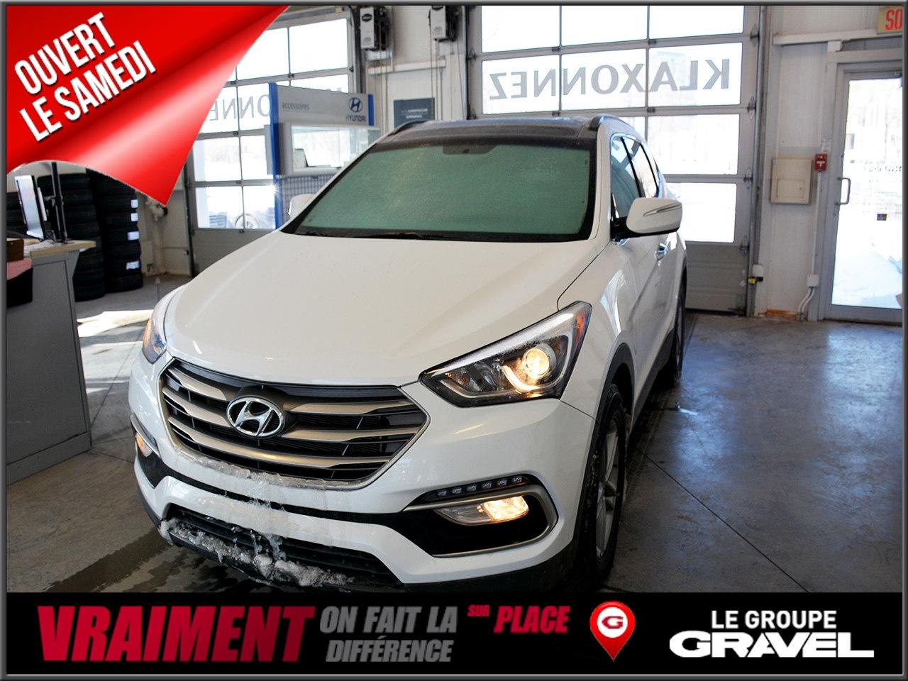 <a href=https://www.iledessoeurshyundai.com/occasion/Hyundai-Santa_Fe_Sport-2018.html>https://www.iledessoeurshyundai.com/occasion/Hyundai-Santa_Fe_Sport-2018.html</a>

JAMAIS ACCIDENTÉ - 1 SEUL PROPRIÉTAIRE - GROUPE ÉLECTRIQUE COMPLET - TOIT OUVRANT PANORAMIQUE - CAMÉRA DE RECUL - MAGS 17 POUCES ( JANTES ALUMINIUM ) - PHARES ANTIBROUILLARDS - AIR CLIMATISÉ - BLUETOOTH - CRUISE CONTROL - LECTEUR CD - VITRES ÉLECTRIQUES - PORTIÈRES ÉLECTRIQUE - MIROIRS ÉLECTRIQUE CHAUFFANTS - ET BEAUCOUP PLUS . . . VENEZ NOUS VOIR !  **Ouvert le samedi de 10h a 16h **.  Nous répondons aux demandes dinformations par courriel 7/7 jours , demandez-nous notre programme VIP pour une expérience unique dans le domaine automobile.Véhicule doccasion inspecté en 150 points mécaniques et esthétiques par nos techniciens expérimentés et le carproof est disponible gratuitement.Le financement sur place 1er, 2e, 3e chance au crédit.Ile des Soeurs Hyundai situé à deux pas du centre ville de Montréal, facile dacces par la Rive Sud et la Rive Nord.Aussi disponible programme certifié Hyundai incluant une garantie supplémentaire dun an ou 20 000 km cumulatif a loriginale de 5 ans / 100 000 km. LE GROUPE GRAVEL DEPUIS 1952...