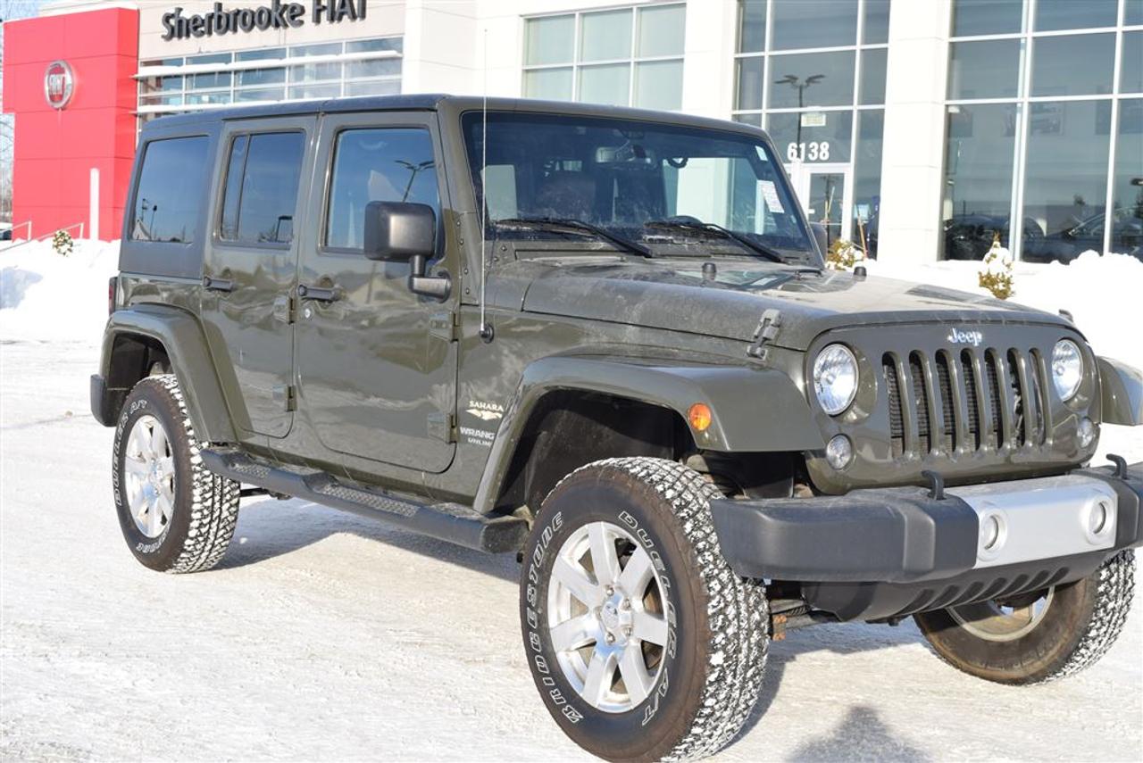 <a href=https://www.elitechrysler.com/occasion/Jeep-Wrangler-2015.html>https://www.elitechrysler.com/occasion/Jeep-Wrangler-2015.html</a>

Prêts pour lhiver!! 2015 Wrangler 4 portes, automatique, 4x4, démarreur à distance, navigation, cuir, sièges chauffants, Bas kilométrage.  Auto, à vendre Chez Élite Chrysler Jeep Dodge Ram, le plus grand choix en inventaire. À Sherbrooke en Estrie   Possibilité de Livraison partout au Québec !!!!!!  Pour plus de détails, pour un essai routier ou même lachat, Communiquer avec lun de nos conseillers en vente sans frais au 1-888-647-5468.  Financement sur place. (1ère et 2ième Chance)