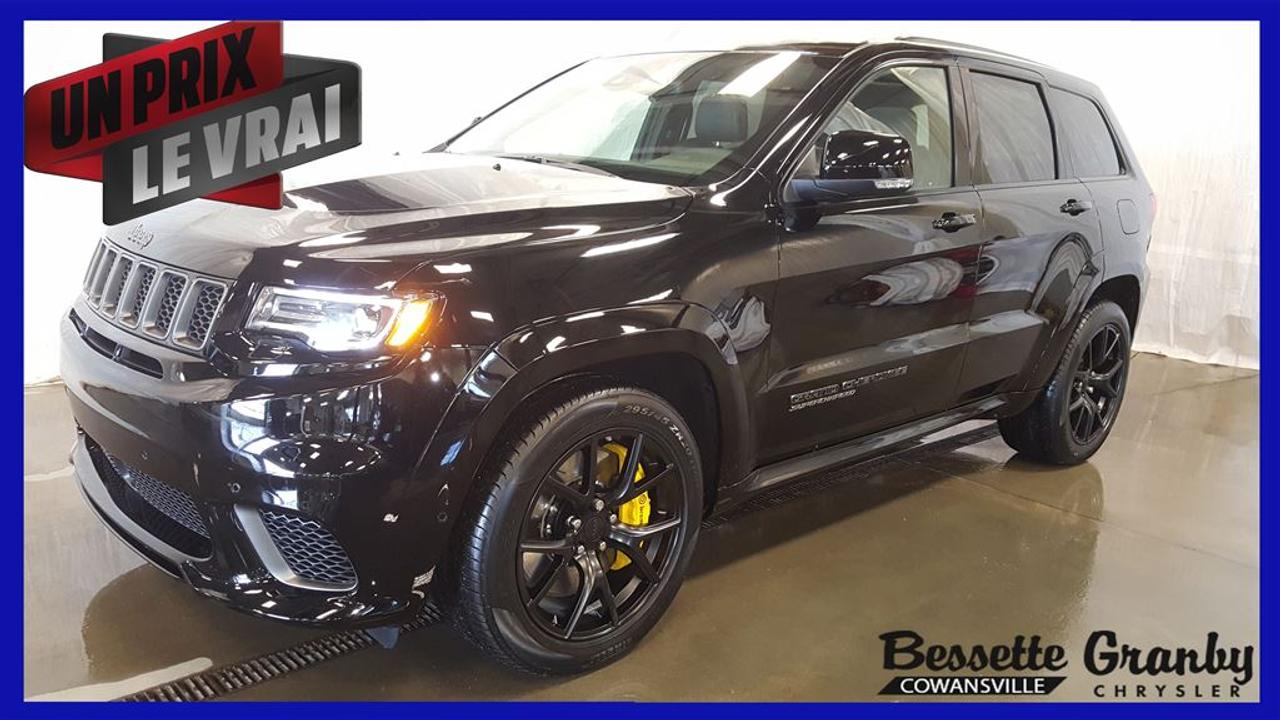 <a href=https://www.granbychrysler.com/occasion/Jeep-Grand_Cherokee-2018.html>https://www.granbychrysler.com/occasion/Jeep-Grand_Cherokee-2018.html</a>

Vus le plus puissant du monde, toit panoramique, intérieur en cuir, roues 20 PO, ceintures de sécurité rouge, ensemble audio haute performance, attelage de remorque, écran tactile 8.4 PO, bluetooth, caméra de recul, navigation        Des transactions sans tracas depuis 60 ans !        Notre politique : Un prix, le vrai.        *Financement rapide aux meilleurs taux de lindustrie    *1,2 et 3 chance au crédit disponible        Appelez-nous pour plus de détails!     Contactez-nous par Texto au numéro 450-915-1404.        ==Téléphonez-nous avant de vous déplacer afin de confirmer lemplacement et la disponibilité ==Tous les rabais sont déjà inclus dans le prix affiché (conquête/loyauté/boni au comptant/etc.)==Financement rapide==2e Chance au crédit disponible==Frais de préparation et de documentation (325$ neuf et 225$ occasion) en sus==Photos à titre indicatif==Le manufacturier ou le concessionnaire peuvent mettre fin à cette offre en tout temps==Vaste inventaire==