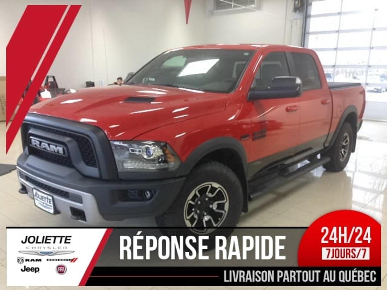 <a href=http://www.joliettedodge.com/occasion/RAM-1500-2015.html>http://www.joliettedodge.com/occasion/RAM-1500-2015.html</a>

RAM REBEL, 4X4, CREW CAB, MOTEUR V8 HEMI, TOIT OUVRANT, CAMÉRA DE RECUL, PARKSENS ARRIÈRE, DÉMARREUR À DISTANCE, ÉCRAN 8.4 POUCE DIGITAL, BLUETOOTH, SYSTÈME DE SON SUPÉRIEUR AVEC 9 HAUT PARLEUR ALPINE ET SUBWOOFER, GROUPE REMORQUAGE AVEC MIROIR ET FREIN DE REMORQUE, ATTACHE REMORQUE, RATIO 3.92, ENTRÉ ET DÉMARRAGE SANS CLEFS, SIÈGE AVANT CHAUFFANT ET ÉLECTRIQUE, VOLANT CHAUFFANT, MIROIR CHAUFFANT, VITRE TEINTÉ , PHARE AUTOMATIQUE, AIR CLIMATISÉ, VITRES ÉLECTRIQUES, PORTE ÉLECTRIQUE, RÉGULATEURDE VITESSE, CHAUFFE MOTEURS. BALANCE DE GARANTIE DE BASEVALIDE JUSQUAU 20 AOÛT 2018 OU 60 000 KILOMÈTRES. BALANCE DE GARANTIE GR MOTOPROPULSEUR VALIDESJUSQUAU 20 AOÛT 2020 OU 100 000 KILOMÈTRES. Véhicule inspecté par un mécanicien professionnel certifiéCAA Québec. Le véhicule a été inspecté réparé et certifié . Notre concessionnaire offre le rapportCarproof et le kilométrage est certifié par notre machine ultra-moderne de laconcession. Grâce à des ententes exclusives, nous offrons un financementà partir de 0.9% disponible et nous avons des spécialistes de 2ième et 3ièmechance au crédit sur place avec plus de 30 ans dexpérience dans le domaine.Pré-approbation de crédit disponible! Nous reprenons les échanges de toutesmarques et grâce à notre important réseau, nous offrons le maximum pour votrevéhicule déchange! Avec plus de 30 ans en service, Joliette Dodge est encoreune entreprise familiale qui sait être à lécoute de ses clients. Cestpourquoi nous avons des avis moyen de 4.5 étoiles sur 5 à travers toute nosplate-forme confondu (Google, Facebook, Reviewsii). Nous sommes à seulement 25minutes de lest de Montréal et de Terrebonne au coin de lautoroute 158 et 31.Nous offrons un service de livraison de véhicule par remorque fermée à lagrandeur de la province. INFO rapide via TEXTO : 450-760-8834 Faite une demande internet ou appelez nous et voyez pourquoichez Joliette Dodge, Ça vaut le détour! Vous cherchez un 4X4 SUV « Truck » Jeepou encore même un camion diesel? www.joliettedodge.com cest plus de 300 véhicules disponibles! (Si vous habitez à plus de 50km de laconcession, avant de passer, renseignez-vous à un représentant sur lapossibilité dobtenir une carte dessence ou Tim Hortons si vous vous déplacezpour venir voir un véhicule). INFO TEXTO,24H/24, 7Jours/7: 450-760-8834 -- We alsospeak English! We are at 25 min of Montreal. Were a family owned business formore than 30 years. We have one of the highest ratings of customer satisfactionin Quebec. See it by yourself: Text us 7 days a week at 450-760-8834. Rapid response guaranteed! Joliette Dodge, Its worth the detour!