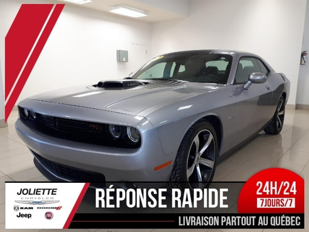 <a href=http://www.joliettedodge.com/occasion/Dodge-Challenger-2017.html>http://www.joliettedodge.com/occasion/Dodge-Challenger-2017.html</a>

CHALLENGER SHAKER AVEC MOTEUR HEMI 5.7L, TOIT OUVRANT, DÉMARREUR À DISTANCE, CAMÉRA DE RECULE, PARKSENS ARRIÈRE, BLUETOOTH, ECRAN TACTILE 8.4 POUCES, ENSEMBLE SUPER TRACK PACK, SUSPENSION SPORTS, SIÈGES ÉLECTRIQUE, VENTILÉS ET CHAUFFANT, VOLANT CHAUFFANT, ENTRÉ SANS CLEFS, PHARE AUTOMATIQUE, PHARE ANTI-BROUILLARD, AIRE CLIMATISÉ DEUX ZONES, RATIO 3.07 VITRE ÉLECTRIQUE, PORTE ÉLECTRIQUE VITRE TEINTÉ, FREINS ABS. BALANCE DE GARANTIE DE BASEVALIDE JUSQUAU 28 JUIN 2020 OU 60 000 KILOMÈTRES. BALANCE DE GARANTIE GR MOTOPROPULSEUR VALIDESJUSQUAU 28 JUIN 2022 OU 100 000 KILOMÈTRES. Véhicule inspecté par un mécanicien professionnel certifié CAA Québec. Le véhicule a été inspecté réparé et certifié . Notre concessionnaire offre le rapport Carproof et le kilométrage est certifié par notre machine ultra-moderne de la concession. Grâce à des ententes exclusives, nous offrons un financement à partir de 0.9% disponible et nous avons des spécialistes de 2ième et 3ième chance au crédit sur place avec plus de 30 ans dexpérience dans le domaine. Pré-approbation de crédit disponible! Nous reprenons les échanges de toutes marques et grâce à notre important réseau, nous offrons le maximum pour votre véhicule déchange! Avec plus de 30 ans en service, Joliette Dodge est encore une entreprise familiale qui sait être à lécoute de ses clients. Cest pourquoi nous avons des avis moyen de 4.5 étoiles sur 5 à travers toute nos plate-forme confondu (Google, Facebook, Reviewsii). Nous sommes à seulement 25 minutes de lest de Montréal et de Terrebonne au coin de lautoroute 158 et 31. Nous offrons un service de livraison de véhicule par remorque fermée à la grandeur de la province. INFO rapide via TEXTO : 450-760-8834 Faite une demande internet ou appelez nous et voyez pourquoi chez Joliette Dodge, Ça vaut le détour! Vous cherchez un 4X4 SUV « Truck » Jeep ou encore même un camion diesel? www.joliettedodge.com cest plus de 300 véhicules disponibles! (Si vous habitez à plus de 50km de la concession, avant de passer, renseignez-vous à un représentant sur la possibilité dobtenir une carte dessence ou Tim Hortons si vous vous déplacez pour venir voir un véhicule). INFO TEXTO, 24H/24, 7Jours/7: 450-760-8834 -- We also speak English! We are at 25 min of Montreal. Were a family owned business for more than 30 years. We have one of the highest ratings of customer satisfaction in Quebec. See it by yourself: Text us 7 days a week at 450-760-8834.