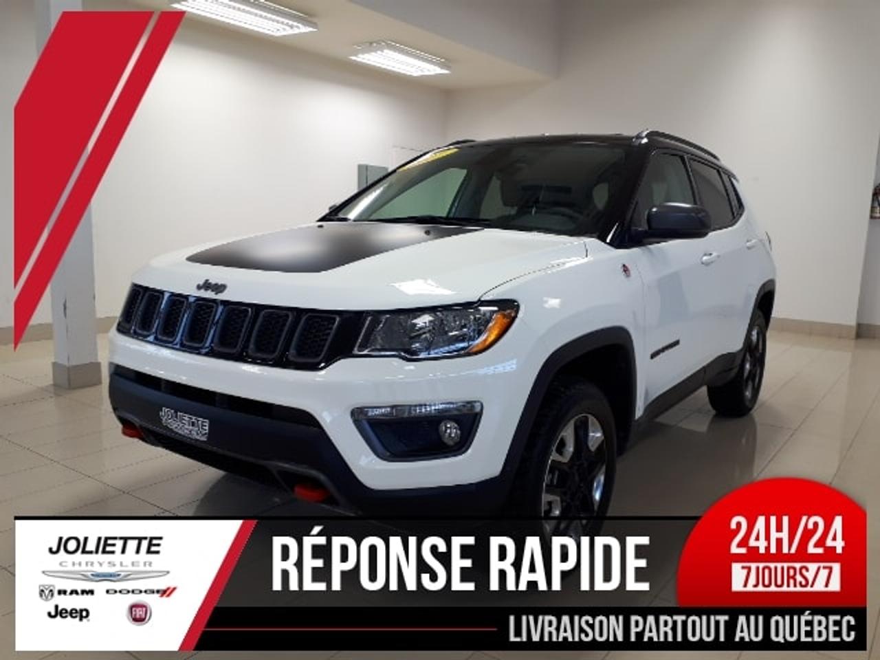 <a href=http://www.joliettedodge.com/occasion/Jeep-Compass-2017.html>http://www.joliettedodge.com/occasion/Jeep-Compass-2017.html</a>

4X4 avec Démarreur à distance, sièges et volant chauffants, volant en cuir, tapis protecteurs toutes saisons, Ensemble de remorquage. INFO TEXTO: 450-760-8834 GROUPES MOTOPROPULSEURS  Modèle 4 X 4  Moteur MultiAirMD de 2,4 L à 4 cylindres en ligne, 7.3L/100km sur la grand route, 10,4/100km en ville. HABITACLE  Éclairage dambiance à DEL dans lhabitacle  Phares automatiques  Longerons de toit noirs  Rétroviseurs extérieurs et poignées de porte couleur carrosserie  Contour de pare-brise brillant  Antibrouillards de virage  Glaces à écran solaire foncé  Système dentrée et démarrage sans clé Enter n GoMC avec capteur de proximité  Écran configurable de 3,5 po intégré au groupe dinstruments  Climatisation  Moquette et boucles darrimage dans lespace de chargement  Tapis protecteurs à lavant et à larrière  Console centrale pleine longueur avec accoudoir coulissant  Volant gainé de cuir  Climatisation avec commande automatique de température bizone  Aménagement :  Sièges baquets en tissu de catégorie supérieure et espace de rangement  Radio satellite SiriusXM avec abonnement de un an(5)  Multimédia :  Pôle multimédia avec une prise dentrée audio pour appareils mobiles et un port USB  Deux prises de courant auxiliaires de 12 volts  Écran couleur configurable de 7 po intégré au groupe dinstruments avec écran tactile de système de communication mains libres(3), lecture audio en transit BluetoothMD et six haut-parleurs  Glaces avant à commande électrique avec commande monotouche à louverture et à la fermeture  Démarrage par bouton-poussoir et éclairage daccueil  Plateau de rangement au plancher dans le coffre  Dégivreur, lave-glace et essuie-glace de lunette  Rétroviseur jour et nuit  Aménagement :  Banquette arrière 60-40 rabattable  Siège du conducteur réglable en hauteur  Siège passager avant rabattable à plat vers lavant  Sièges du conducteur et du passager avant à six réglages manuels  Sièges chauffants à dessus en cuir avec empiècements ombrés en filet, coutures contrastantes rouge rubis et logo en relief  Pare-soleil coulissants avec miroirs  Commandes audio et régulateur de vitesse sur le volant  Colonne de direction inclinable et télescopique CARACTÉRISTIQUES EXTÉRIEURES  Autocollant antireflet sur le capot  Enjoliveur de calandre noir avec anneaux enjoliveurs gris neutre  Garnitures intérieures noires avec coutures contrastantes rouges  Toit noir avec longerons de toit gris neutre  Rétroviseurs chauffants, à commande électrique et repliables manuellement  Trappe de carburant sans bouchon  Quatre phares halogènes et feux arrière à ampoules incandescentes  Glaces à filtre UV  Pneus et roues :  Roues de 17 po en aluminium poli avec creux peints noirs  Pneus route/hors route 215/65R17 à FN  Pneu de secours pleine grandeur  Emblème Trailhawk SÉCURITÉ  Freins antiblocage à disque aux quatre roues  Sept sacs gonflables(8)  Frein de stationnement électrique  Système électronique dantidérapage (ESC)(9) avec assistance au départ en pente, antipatinage toutes vitesses, dispositif électronique antiroulis, dispositif antilouvoiement de la remorque et assèchement automatique des freins  Appuie-têtes réactifs sur les sièges avant(12)  Télédéverrouillage et bouton dalarme  Verrouillage électrique des portes activé par la vitesse  Trousse de réparation de pneus COMPÉTENCES  Alternateur de 160 A  Direction à assistance électrique  Chauffe-bloc  Système 4x4 Jeep® Active Drive (modèles 4x4 seulement)  Système 4x4 Jeep Active Drive Low avec système de gestion de la motricité Selec-Terrain amélioré  Plaques de protection sous le réservoir de carburant, la boîte de transfert, la transmission et la suspension avant  Limiteur de vitesse en descente  Suspension hors route Crochets de remorquage rouges, deux à lavant et un à larrière  Tapis protecteurs avant et arrière toutes saisons Grâce à un important réseau bâti en plus de 30 années de service, nous allouons également des montants exceptionnels sur TOUS les échanges, de toutes les marques! Nous reprenons même en échange les bateaux, motos, motoneiges, etc. Tout cela accompagné de notre service exceptionnel comme le démontre notre moyenne de 4.5/5 étoiles sur plus de 300 avis Google/Facebook/Reviewsii. Nous sommes une concession familiale en affaire depuis plus de 30 ans qui font tout en leur possible pour offrir un service exceptionnel autant à la vente quau service après-vente. Nous sommes lune des rares concessions recommandées CAA Québec, ce qui signifie un taux de satisfaction de la clientèle de plus de 95% pour le service après-vente! Nous sommes à seulement 25 minutes de lest de Montréal et de Terrebonne au coin de la route 158 et autoroute 31. Nous offrons un service de livraison rapide à la grandeur de la province par remorque fermée. INFO TEXTO: 450-760-8834 PS. Plusieurs promotions Chrysler Dodge Jeep et Ram pour: employés de Bell Canada, Firestone, Cascades et plusieurs autres compagnies appelez-nous pour savoir si vous êtes éligibles à un programme spécial! -- We also speak English! We are at 25 min of Montreal. Were a family owned business for more than 30 years. We have one of the highest ratings of customer satisfaction in Quebec. See it by yourself: Text us 7 days a week at 450-760-8834. Rapid response guaranteed! Joliette Dodge, Its worth the detour!