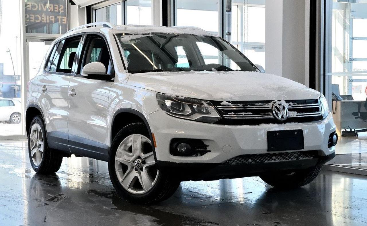 <a href=https://www.vaudreuilvolkswagen.com/occasion/Volkswagen-Tiguan-2015.html>https://www.vaudreuilvolkswagen.com/occasion/Volkswagen-Tiguan-2015.html</a>

Modèle Comfortline , toit panoramique, intérieur en similicuir, caméra de recul, air climatisée, Bluetooth, bancs chauffants et roues 17 pouces .     Possibilité dextension de 2 ans ou 40 000 kms de la garantie dorigine avec la certification supérieure Volkswagen    Aucunes obligations bancaires, aucuns frais cachés    Mise en service : 11 Decembre 2014