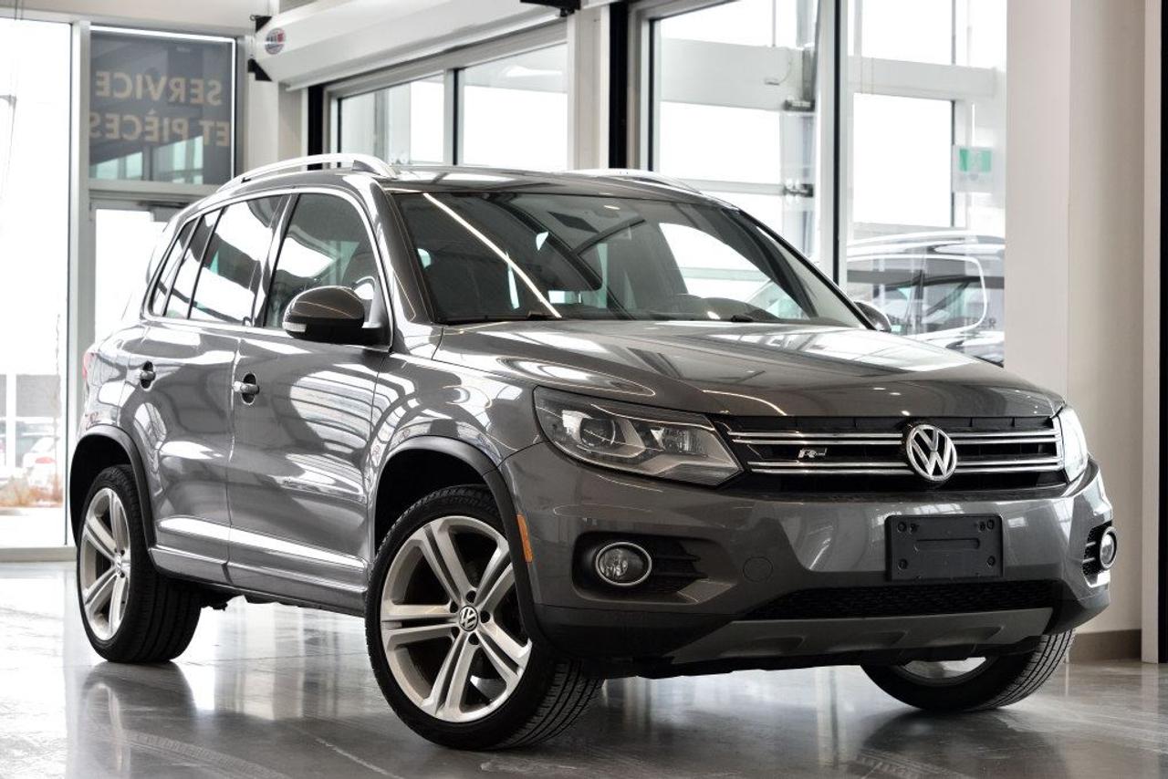 <a href=https://www.vaudreuilvolkswagen.com/occasion/Volkswagen-Tiguan-2014.html>https://www.vaudreuilvolkswagen.com/occasion/Volkswagen-Tiguan-2014.html</a>

Modèle Highline 4motion avec intérieur en cuir brun. Roues 19, Toit panoramique, écran multimédia, sièges électriques avec mémoire, lumière automatiques, climatisation deux-zones et essuie-glaces automatiques, Bluetooth. Aucuns accidents.        Possibilité dextension de 2 ans ou 40 000 kms de la garantie dorigine avec la certification supérieure Volkswagen        Aucunes obligations bancaires, aucuns frais cachés        Mise en service : 2 Janvier 2014