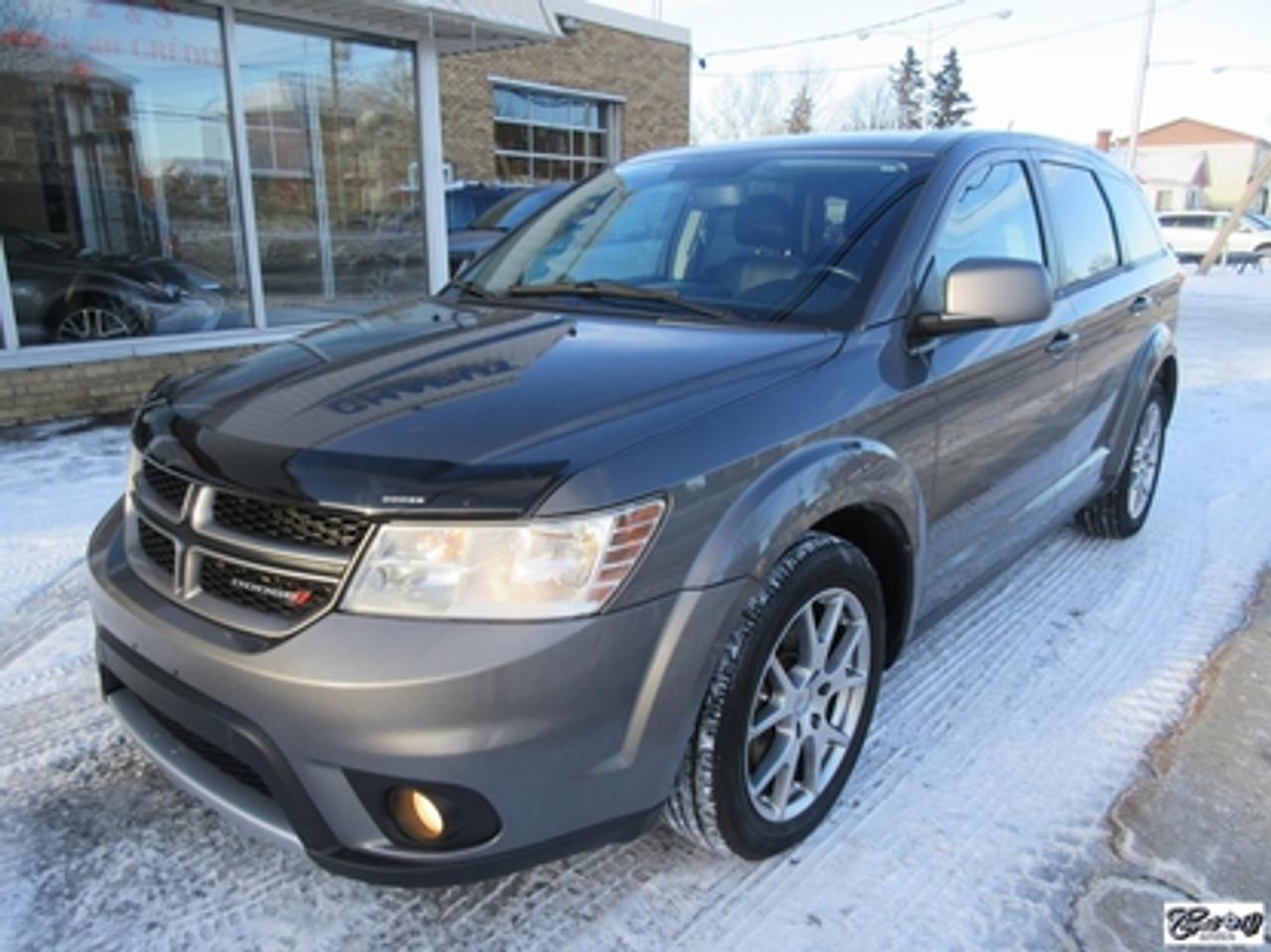 <a href=https://www.autoaubaine.com/Dodge-Journey-c7002458.html>https://www.autoaubaine.com/Dodge-Journey-c7002458.html</a>

Dodge Journey R/t Rallye 2013\n\nRégulateur de vitesse, Essuie-glaces intermittents, Essuie-glace arrière, Anti-démarreur, Freins ABS, Contrôle de stabilité, Coussin gonflable conducteur, Démarreur à distance, Lecteur CD, Lecteur MP3, Chauffe-moteur, Miroirs chauffants, Portes électriques, Sièges électriques, Tachymètre, Vitres électriques, Air climatisé, Intérieur en cuir, Climatisation deux zones, Commandes audio au volant, Sièges arrières rabattables, Sièges chauffants, Volant ajustable, Tapis protecteurs, Vitres teintées, Radio satellite, Ordinateur de bord, Caméra de recul, Radio AM/FM, Direction assistée, Télédéverrouillage, Système dalarme, Rétroviseurs électriques, Jantes en alliage, Antipatinage, Phares antibrouillards, Coussins gonflables, Verrous de sécurité pour enfants, Système de surveillance de la pression des pneus, Dégivreur de lunette arrière, Miroirs ajustables de lintérieur, Sièges baquets, Technologie Bluetooth intégrée, Port USB, Climatiseur automatique, Aide au stationnement (capteurs), Volant chauffant\n\nÉdition spéciale RALLYE, intérieur en cuir avec coutures rouges, sièges et volant chauffants, caméra de recul, dem. à distance, NAVIGATION, bluetooth, AWD, gr. électrique, A/C et +++.  Pneus YOKAHAMA comme neufs, très bien entretenu, le grand luxe à petit prix!!!  CARPROOF DISPONIBLE, aucun accident...

*****TEXTOS BIENVENUE 514 707-4090*****

CHAPUT AUTO CONCESSIONNAIRE CHRYSLER JEEP RAM À VARENNES DEPUIS PLUS DE 65 ANS. TOUS NOS VÉHICULES SONT INSPECTÉS, RÉPARÉS ET GARANTIS. FINANCEMENT RAPIDE SUR PLACE 2 IÈME ET 3 IÈME CHANCE AU CRÉDIT, AUCUN CAS REFUSÉ.  

     WWW.CHAPUTOCCASION.COM

SBELLEMARE@CHAPUTAUTOMOBILE.COM

*****OUVERT LE SAMEDI DE 10H À 16H*****
