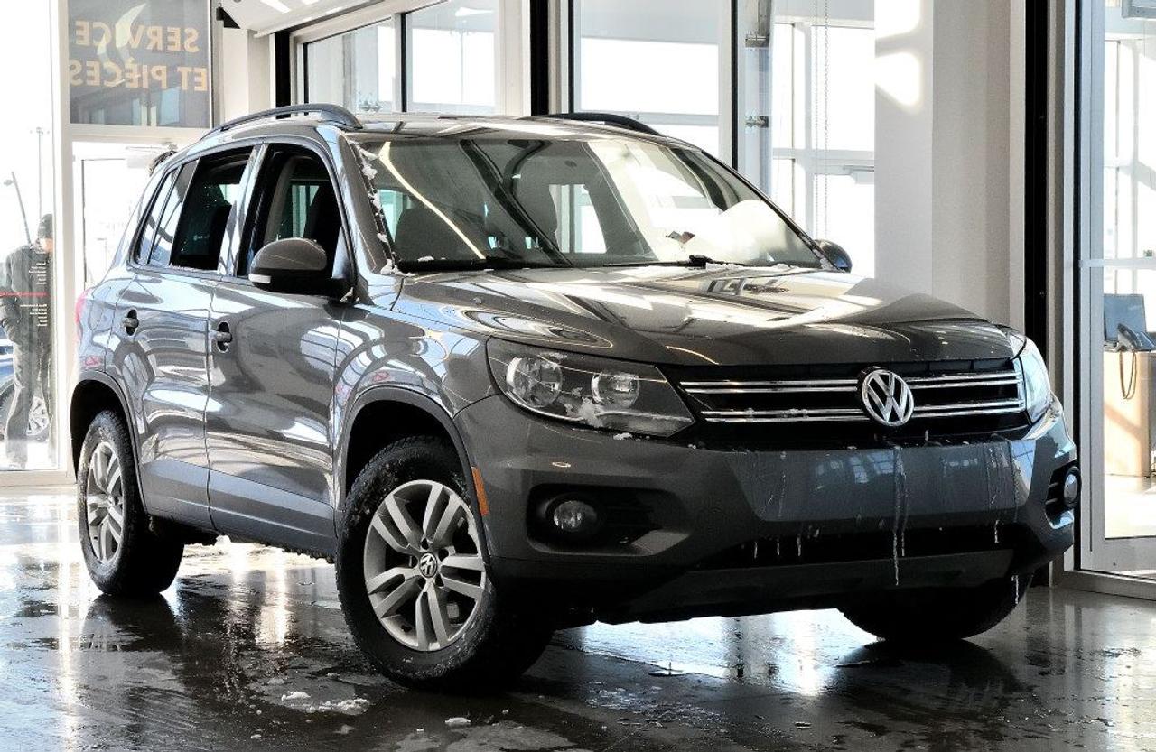 <a href=https://www.vaudreuilvolkswagen.com/occasion/Volkswagen-Tiguan-2014.html>https://www.vaudreuilvolkswagen.com/occasion/Volkswagen-Tiguan-2014.html</a>

Modèle Trendline 4Motion, équipé de Bluetooth, bancs chauffants, air climatisé, roues 16, régulateur de vitesse et miroirs électriques chauffants, phares anti-brouillard. Retour de location.    Possibilité dextension de 2 ans ou 40 000 kms de la garantie dorigine avec la certification supérieure Volkswagen    Aucunes obligations bancaires, aucuns frais cachés    Mise en service : 12 décembre 2013    Bienvenue chez Vaudreuil Volkswagen!