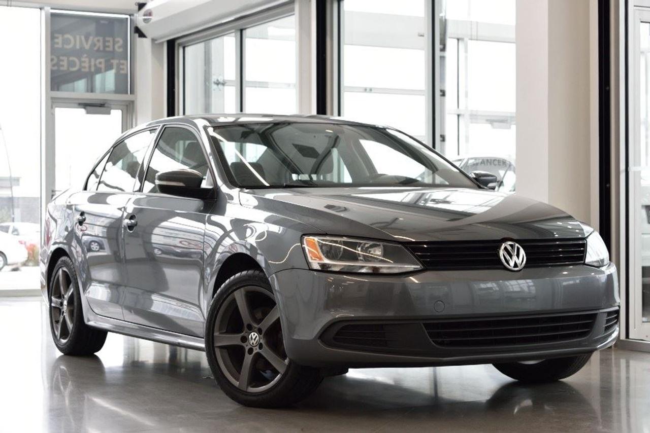 <a href=https://www.vaudreuilvolkswagen.com/occasion/Volkswagen-Jetta-2014.html>https://www.vaudreuilvolkswagen.com/occasion/Volkswagen-Jetta-2014.html</a>

Modèle Trendline+ avec air climatisé, Jantes 17, bancs chauffants, mirroirs électriques chauffants, régulateur de vitesse, groupe électrique. Retour de location, jamais accidenté.        Possibilité dextension de 2 ans ou 40 000 kms de la garantie dorigine avec la certification supérieure Volkswagen        Aucunes obligations bancaires, aucuns frais cachés        Mise en service : 13 Décembre 2013        ***************************************************************************************Bienvenue chez Vaudreuil Volkswagen, notre concession est située à seulement 10 minutes de Montréal et, ici, le personnel vous accueille dans une ambiance familiale et souriante. Nous vous offrons une livraison rapide en 24 heures*, et celle-ci est disponible partout au Québec*. Nos spécialistes de la finance vous offre la 1 ère, 2e ou 3e chance au crédit et vous obtiendrez également sur les véhicules doccasions certifiés des taux à partir de 0 %* !! Ici, tous nos véhicules Volkswagen sont inspectés, reconditionnés avec des pièces dorigines, certifiés par nos techniciens Volkswagen, donc, garanties lorsque vous quittez la concession. Vous obtenez donc un véhicule en parfaite condition, de qualité supérieure, et ce, surpassant les normes de lindustrie! Les meilleurs avantages du marché de lautomobile vous sont maintenant offerts sous un même toit !! Véhicule déchange ? Pas de problème! Nous achetons votre véhicule et ce, même si vous nachetez pas chez nous! Ici chez Vaudreuil Volkswagen, on soccupe de tout et surtout de vous! ************************************************************************************** * Détails en concession Welcome to Vaudreuil Volkswagen, our dealership is only 10 minutes from Montreal and here, the staff will greet you in a family and smiling atmosphere. We offer you a fast delivery in only 24 hours*, available across the entire Quebec territory*. Our financing specialists offer you 1st, 2nd and 3rd chance credit application and you will also obtain 0% financing on certified pre-owned vehicles!! Here, all our Volkswagen vehicles are thoroughly inspected, reconditioned with original Volkswagen parts, certified by our master technicians and covered by warranty when you leave the dealership. This way you acquire a vehicle in mint condition, high quality, surpassing all market standards! You get the best of automotive business all in one location! You would like to give your car in exchange? We buy your car even if you dont buy from us! At Volkswagen Vaudreuil, we take care of everything, especially you! *Details in store ***************************************************************************************