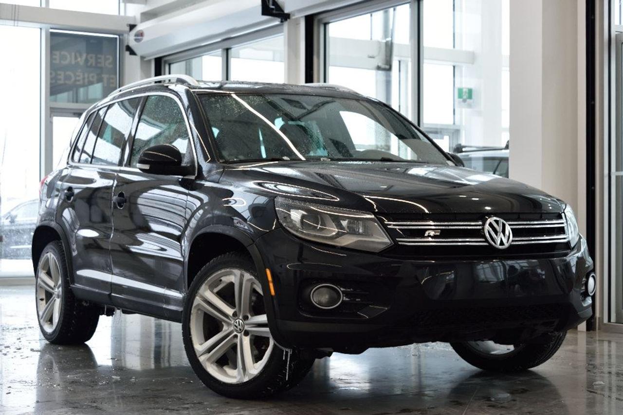 <a href=https://www.vaudreuilvolkswagen.com/occasion/Volkswagen-Tiguan-2013.html>https://www.vaudreuilvolkswagen.com/occasion/Volkswagen-Tiguan-2013.html</a>

Modèle Highline 4motion avec intérieur en cuir noir, ensemble R-Line. Roues 19, Toit panoramique, sièges électriques avec mémoire, lumière automatiques, climatisation deux-zones et essuie-glaces automatiques, volant sport R-line. Un seul propriétaire    Possibilité dextension de 2 ans ou 40 000 kms de la garantie dorigine avec la certification supérieure Volkswagen    Aucunes obligations bancaires, aucuns frais cachés    Mise en service : 19 septembre 2013