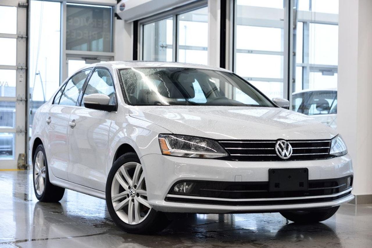 <a href=https://www.vaudreuilvolkswagen.com/occasion/Volkswagen-Jetta-2017.html>https://www.vaudreuilvolkswagen.com/occasion/Volkswagen-Jetta-2017.html</a>

Modèle Highline, détection dangles morts, éclairage dambiance, phares antibrouillards, toit ouvrant, intérieur en cuir, roues de 17, Bluetooth et App-Connect , caméra de recul, moteur 1.8T siège électrique, climatisation double-zones, entrée et démarrage sans clef Kessy. Véhicule de fonction de VW Canada, jamais accidenté.    Possibilité dextension de 2 ans ou 40 000 kms de la garantie dorigine avec la certification supérieure Volkswagen    Aucunes obligations bancaires, aucuns frais cachés    Mise en service : 30 novembre 2016    ***************************************************************************************Bienvenue chez Vaudreuil Volkswagen, notre concession est située à seulement 10 minutes de Montréal et, ici, le personnel vous accueille dans une ambiance familiale et souriante. Nous vous offrons une livraison rapide en 24 heures*, et celle-ci est disponible partout au Québec*. Nos spécialistes de la finance vous offre la 1 ère, 2e ou 3e chance au crédit et vous obtiendrez également sur les véhicules doccasions certifiés des taux à partir de 0 %* !! Ici, tous nos véhicules Volkswagen sont inspectés, reconditionnés avec des pièces dorigines, certifiés par nos techniciens Volkswagen, donc, garanties lorsque vous quittez la concession. Vous obtenez donc un véhicule en parfaite condition, de qualité supérieure, et ce, surpassant les normes de lindustrie! Les meilleurs avantages du marché de lautomobile vous sont maintenant offerts sous un même toit !! Véhicule déchange ? Pas de problème! Nous achetons votre véhicule et ce, même si vous nachetez pas chez nous! Ici chez Vaudreuil Volkswagen, on soccupe de tout et surtout de vous! ************************************************************************************** * Détails en concession Welcome to Vaudreuil Volkswagen, our dealership is only 10 minutes from Montreal and here, the staff will greet you in a family and smiling atmosphere. We offer you a fast delivery in only 24 hours*, available across the entire Quebec territory*. Our financing specialists offer you 1st, 2nd and 3rd chance credit application and you will also obtain 0% financing on certified pre-owned vehicles!! Here, all our Volkswagen vehicles are thoroughly inspected, reconditioned with original Volkswagen parts, certified by our master technicians and covered by warranty when you leave the dealership. This way you acquire a vehicle in mint condition, high quality, surpassing all market standards! You get the best of automotive business all in one location! You would like to give your car in exchange? We buy your car even if you dont buy from us! At Volkswagen Vaudreuil, we take care of everything, especially you! *Details in store ***************************************************************************************