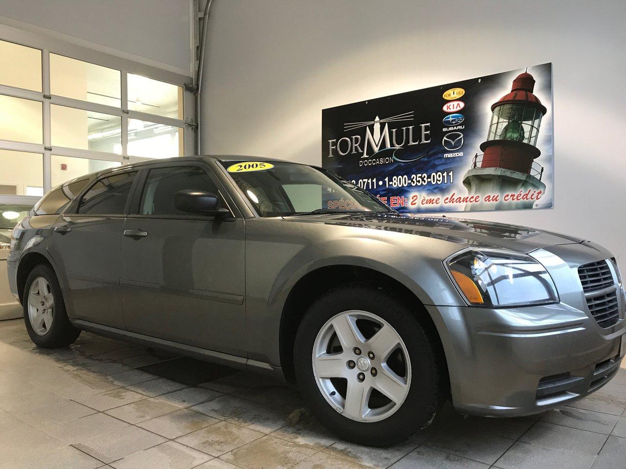 <a href=https://www.autoaubaine.com/Dodge-Magnum-c7011922.html>https://www.autoaubaine.com/Dodge-Magnum-c7011922.html</a>

Dodge Magnum SE 2005\n\nRégulateur de vitesse, Essuie-glaces intermittents, Anti-démarreur, Freins ABS, Contrôle de stabilité, Coussin gonflable conducteur, Lecteur CD, Portes électriques, Vitres électriques, Air climatisé, Lampes de lecture arrière, Volant ajustable, Enjoliveurs, Tapis protecteurs, Rétroviseur électrique, Direction assistée, Siège à réglage électrique, Siège conducteur - soutien lombaire, Siège passager - soutien lombaire, Freins à disque, Jantes en alliage, Antipatinage, Verrous de sécurité pour enfants, Sièges baquets, Climatisation arrière, Climatisation\n\nPOUR LE PLUS GRAND CHOIX À UN SEUL ENDROIT, LE MEGA CENTRE DE LUSAGÉ DANS LEST DU QUÉBEC. COUVRANT LA GRANDE RÉGION DE RIMOUSKI, MATANE, MONT-JOLI, RIVIÈRE-DU-LOUP, STE-ANNE DES MONTS, MATAPÉDIA,GASPÉSIE... CONTACTEZ-NOUS SANS FRAIS AU 1-877-864-3666 LIVRAISON PARTOUT AU QUÉBEC.