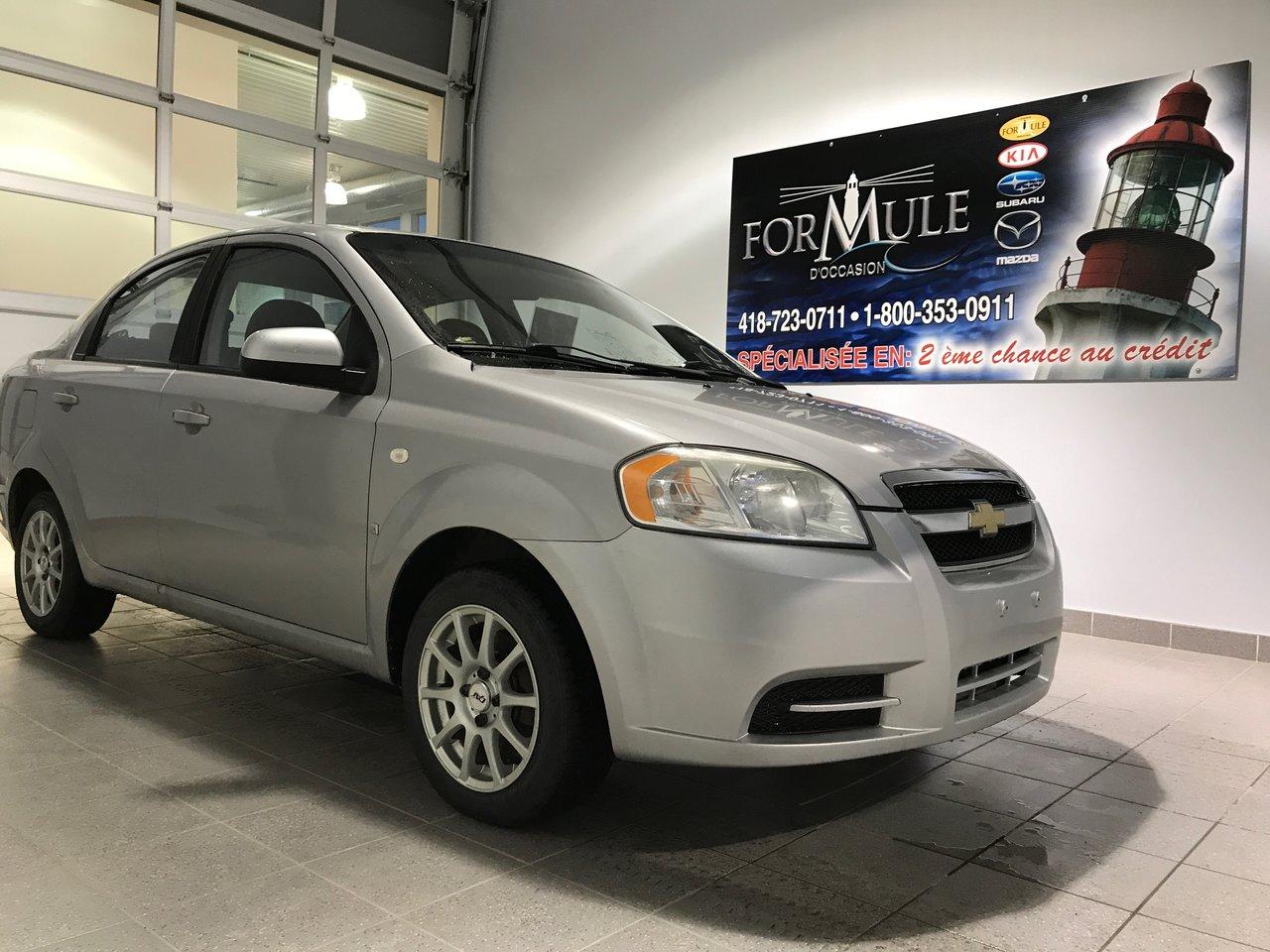 <a href=https://www.autoaubaine.com/Chevrolet-Aveo-c6949677.html>https://www.autoaubaine.com/Chevrolet-Aveo-c6949677.html</a>

Chevrolet Aveo LS 2008\n\nEssuie-glaces intermittents, Anti-démarreur, Coussin gonflable conducteur, Lecteur CD, Lecteur MP3, Volant ajustable, Enjoliveurs, Tapis protecteurs, Direction assistée, Sièges tissu, Freins à disque, Verrous de sécurité pour enfants, Sièges baquets\n\nPOUR LE PLUS GRAND CHOIX À UN SEUL ENDROIT, LE MEGA CENTRE DE LUSAGÉ DANS LEST DU QUÉBEC. COUVRANT LA GRANDE RÉGION DE RIMOUSKI, MATANE, MONT-JOLI, RIVIÈRE-DU-LOUP, STE-ANNE DES MONTS, MATAPÉDIA,GASPÉSIE... CONTACTEZ-NOUS SANS FRAIS AU 1-877-864-3666 LIVRAISON PARTOUT AU QUÉBEC.