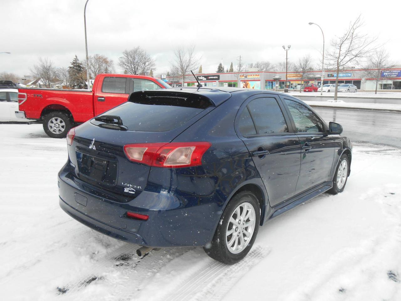 664733.11689338