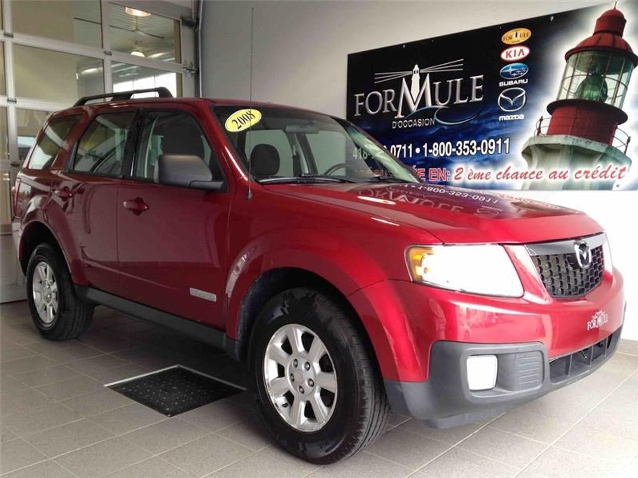 <a href=https://www.autoaubaine.com/Mazda-Tribute-c7018995.html>https://www.autoaubaine.com/Mazda-Tribute-c7018995.html</a>

Mazda Tribute GX 2008\n\nEssuie-glaces intermittents, Anti-démarreur, Freins ABS, Contrôle de stabilité, Coussin gonflable conducteur, Coussins gonflables latéraux, Lecteur CD, Portes électriques, Vitres électriques, Air climatisé, Lampes de lecture arrière, Volant ajustable, Tapis protecteurs, Rétroviseur électrique, Direction assistée, Rétroviseurs chauffants, Coussins gonflables arrière pour la tête, Sièges tissu, Freins à disque, Jantes en alliage, Antipatinage, Phares antibrouillards, Verrous de sécurité pour enfants, Système de surveillance de la pression des pneus, Sièges baquets, Aluminium, Climatisation\n\nPOUR LE PLUS GRAND CHOIX À UN SEUL ENDROIT, LE MEGA CENTRE DE LUSAGÉ DANS LEST DU QUÉBEC. COUVRANT LA GRANDE RÉGION DE RIMOUSKI, MATANE, MONT-JOLI, RIVIÈRE-DU-LOUP, STE-ANNE DES MONTS, MATAPÉDIA,GASPÉSIE... CONTACTEZ-NOUS SANS FRAIS AU 1-877-864-3666 LIVRAISON PARTOUT AU QUÉBEC.