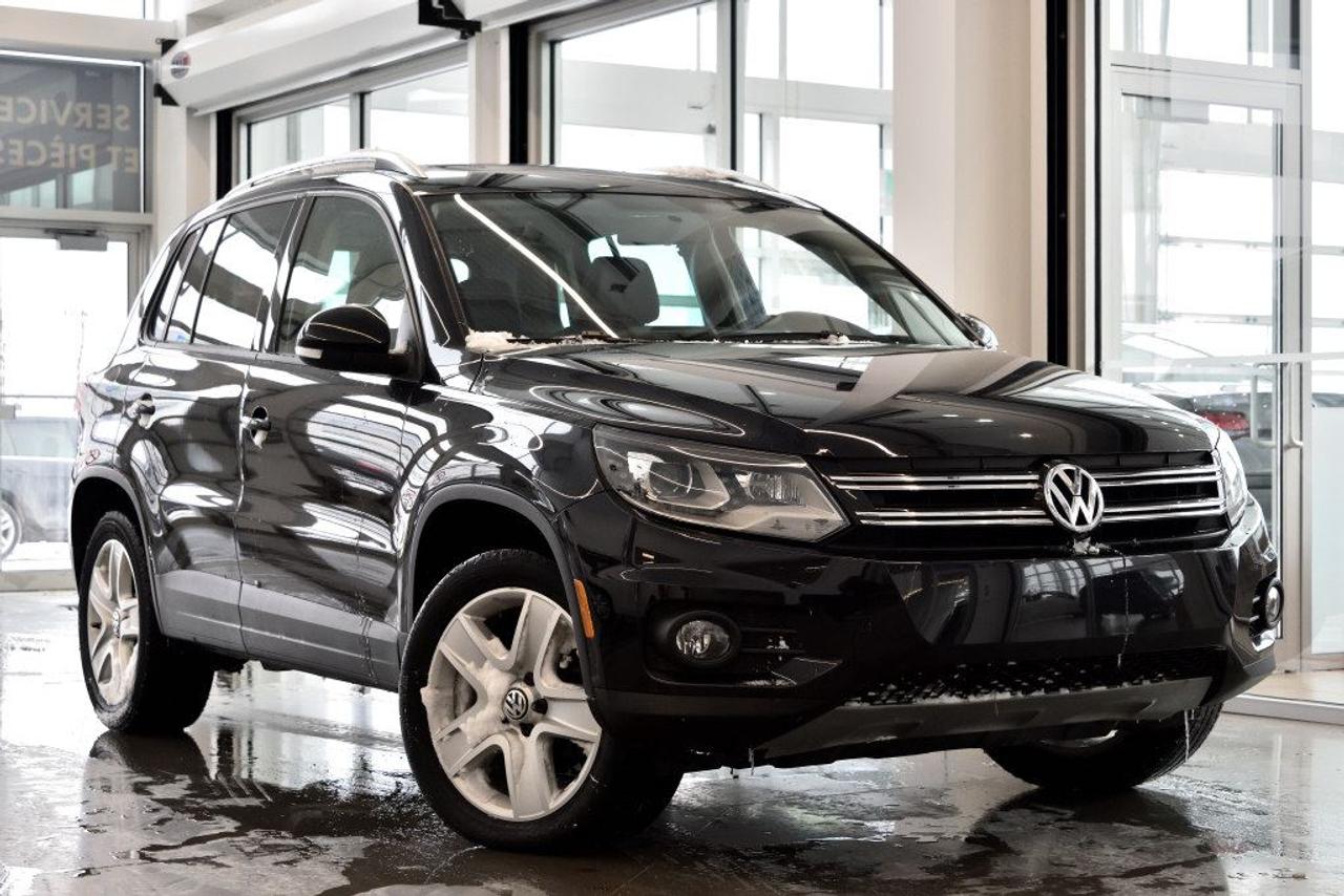 <a href=https://www.vaudreuilvolkswagen.com/occasion/Volkswagen-Tiguan-2014.html>https://www.vaudreuilvolkswagen.com/occasion/Volkswagen-Tiguan-2014.html</a>

Modèle Comfortline 4Motion avec ensemble sport, lumières xénon et DEL, toit panoramique, intérieur en similicuir, air climatisé, Bluetooth, bancs chauffants et roues 18 pouces. Jamais accidenté.    Possibilité dextension de 2 ans ou 40 000 kms de la garantie dorigine avec la certification supérieure Volkswagen    Aucunes obligations bancaires, aucuns frais cachés    Mise en service : 17 Décembre 2013