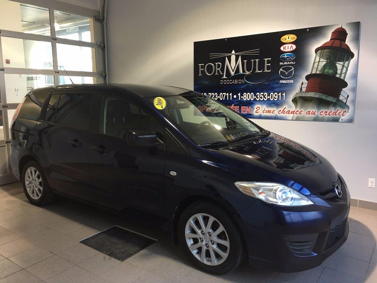 <a href=https://www.autoaubaine.com/Mazda-5-c6949667.html>https://www.autoaubaine.com/Mazda-5-c6949667.html</a>

Mazda Mazda5 GS 2009\n\nEssuie-glaces intermittents, Freins ABS, Coussin gonflable conducteur, Coussins gonflables latéraux, Lecteur CD, Portes électriques, Vitres électriques, Air climatisé, Lampes de lecture arrière, Volant ajustable, Tapis protecteurs, Phares automatiques, Rétroviseur électrique, Direction assistée, Sièges de troisième rangée, Coussins gonflables arrière pour la tête, Siège conducteur - soutien lombaire, Freins à disque, Verrous de sécurité pour enfants, Sièges baquets, Aluminium\n\nPOUR LE PLUS GRAND CHOIX À UN SEUL ENDROIT, LE MEGA CENTRE DE LUSAGÉ DANS LEST DU QUÉBEC. COUVRANT LA GRANDE RÉGION DE RIMOUSKI, MATANE, MONT-JOLI, RIVIÈRE-DU-LOUP, STE-ANNE DES MONTS, MATAPÉDIA,GASPÉSIE... CONTACTEZ-NOUS SANS FRAIS AU 1-877-864-3666 LIVRAISON PARTOUT AU QUÉBEC.