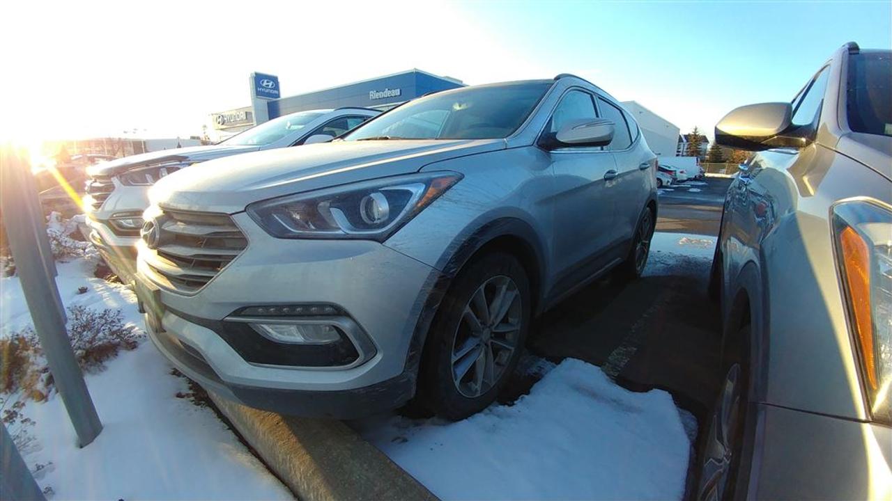 <a href=https://www.riendeauhyundai.com/occasion/Hyundai-Santa_Fe_Sport-2017.html>https://www.riendeauhyundai.com/occasion/Hyundai-Santa_Fe_Sport-2017.html</a>

**JAMAIS ACCIDENTÉ** ENTIÈREMENT ÉQUIPER, PORTES ET VITRES ÉLECTRIQUES, CLIMATISATION BI-ZONE, BANCS CHAUFFANTS/CLIMATISÉS,CAMERA DE RECUL, GPS, BLUETOOTH, RÉGULATEUR DE VITESSE, COMMANDES AUDIO MONTÉS AU VOLANT, PHARES ANTI-BROUILLARDS, AWD, CUIR, TOIT OUVRANT PANORAMIQUE ETC....rabais de 500$ au financement déja inclus dans le prix affiché.        RIENDEAU HYUNDAI        Un concessionnaire établi depuis 1993 ayant vue 3 générations.           Ouvert le samedi de 10h à 16h      Rejoignez-nous en tout temps au 514-709-2886.           Vous manquez de temps pour venir nous visiter? Laissez-nous le savoir et profitez de notre service de visite à domicile ou au travail selon votre horaire!           Sachez que tous nos véhicules sont inspectés par nos techniciens certifiés Hyundai et quun rapport Carproof est disponible en tout temps sur demande.           Venez faire lexpérience Riendeau Hyundai et choisissez parmi notre vaste inventaire de véhicules doccasion avec des taux certifiés à partir de 2.9% et demandez à propos de nos promotions sur nos pneus dhivers.           À proximité de Montréal, Longueuil, Brossard, St-Hubert, St-Hyacinthe, Drummondville, Saint-Basile-le-Grand, Boucherville, Varennes et Chambly. Venez constatez pourquoi tant de clients choisissent Riendeau Hyundai et rien dautre.           ================================================================          A dealer establish since 1993 and with 3 generations.           Open on Saturday from 10h to 16h.       Call us anytime at 514-709-2886.           Lacking time to visit us? Let us know and benefit of our home and office service following your schedule.           Know that our vehicles are inspected by our Hyundai certified technicians and that a Carproof report is available at anytime on demand.           Come meet the experience Riendeau Hyundai and chose within our massive inventory of used car with certified interest rate starting at 2.9% and ask us about our promotion on winter tires.          Close to Montreal, Longueuil, Brossard, St-Hubert, Ste-Hyacinthe, Drummondville, Saint-Basile-le-Grand, Boucherville, Varennes and Chambly. Let us show you why so many customer choose Riendeau Hyundai and nothing else!