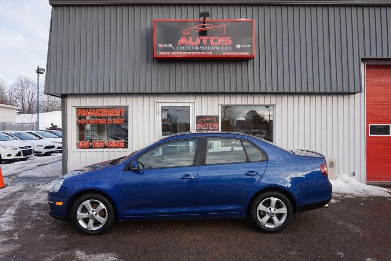 <a href=https://www.autosoccasions.ca/occasion/Volkswagen-Jetta-2009.html>https://www.autosoccasions.ca/occasion/Volkswagen-Jetta-2009.html</a>

VOLKSWAGEN JETTA 2009 Berline Édition Comfortline 5cyl 2.5 Litres ** FULL ÉQUIPÉ A/C MAGS SIÈGES CHAUFFANTS -- TRANSMISSION MANUELLE 5 VITESSES -- AVEC SEULEMENT 152 000 KM CERTIFIÉ VOLKSWAGEN / JAMAIS ACCIDENTÉ : ENTRETENUE AVEC SOIN / 5 CYLINDRES 2.5 Litres TRÈS ÉCONOMIQUE ET FIABILITÉ RECONNUE (JAMAIS ACCIDENTÉ : RAPPORT CARPROOF DISPONIBLE) COULEUR EXTÉRIEUR BLEU, INTÉRIEUR GRIS FONCÉ - NOIR / SIÈGES CHAUFFANTS. INSPECTION COMPLÈTE INCLUSE -- ÉCHANGE ACCEPTÉ -- FINANCEMENT SUR PLACE À PARTIR 4.99 % -- GARANTIE INCLUS : 1 MOIS OU 1700 KM GROUPE MOTOPROPULSEUR -- POSSIBILITÉ DE GARANTIE PROLONGÉE À PRIX IMBATTABLE Avec Caa et Groupe Ppp. ÉQUIPEMENT COMPLET Comfortline : AIR CLIMATISÉ - RÉGULATEUR DE VITESSES - AILERON - JANTES 16 POUCES / PNEUS DÉTÉ EXCELLENT - SIÈGES CHAUFFANTS - TÉLÉVÉROUILLAGE À DISTANCE - LECTEUR CD-Mp3 - GROUPES ÉLECTRIQUES COMPLETS - VALISE ÉLECTRIQUE - VOLANT AJUSTABLE === POUR PLUS DINFORMATION DEMANDER (DAVID.LAMONTAGNE) 418-903-5882 // 418-931-4036 Cell === FINANCEMENT FACILE SUR PLACE 4.99 % NOUS SOMMES OUVERTS 6 JOURS : 2430 BOUL GUILLAUME-COUTURE, LÉVIS G6W-2R5 : AU PLAISIR DE VOUS SERVIR WWW.AUTOSOCCASIONS.CA