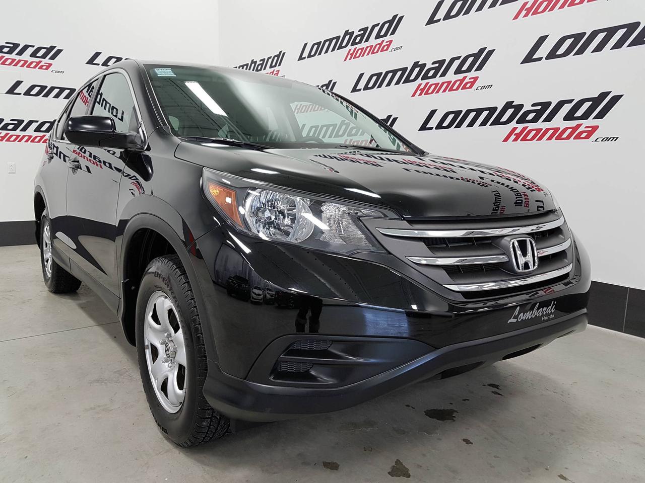 <a href=https://www.lombardihonda.com/occasion/Honda-CRV-2014.html>https://www.lombardihonda.com/occasion/Honda-CRV-2014.html</a>

***GARANTIE PROLONGÉE DISPONIBLE***NOUS DONNONS LE MAXIMUM POUR VOTRE ÉCHANGES*** 
Tout le Confort pour vous incluant Technologie Bluetooth intégrée, 
Lampes de lecture arrière, Commandes audio au volant, Banquette arrière divisé, Climatisation deux zones, Lunette arrière coulissante, Volant ajustable, sièges baquets, Lecteur MP3
Rétroviseurs électriques, Prise Auxiliaire, Prise de courant 400 W (115 V)
Phares automatiques et PLUS..
Cest un véhicule économique au niveau de sa consommation dessence et il conserve très bien sa valeur. Cette voiture est comparable à RAV4 , Santa fe, Rogue. Les conducteurs dun véhicule Honda, que ce soit une voiture neuve ou doccasion, peuvent compter sur lappui inconditionnel et lexpérience de Lombardi Honda à Montréal près de la Rive-Nord et la Rive-Sud.
VENEZ RENCONTRER NOTRE PERSONNEL ENTIÈREMENT DÉDIÉ A VOTRE SATISFACTION !