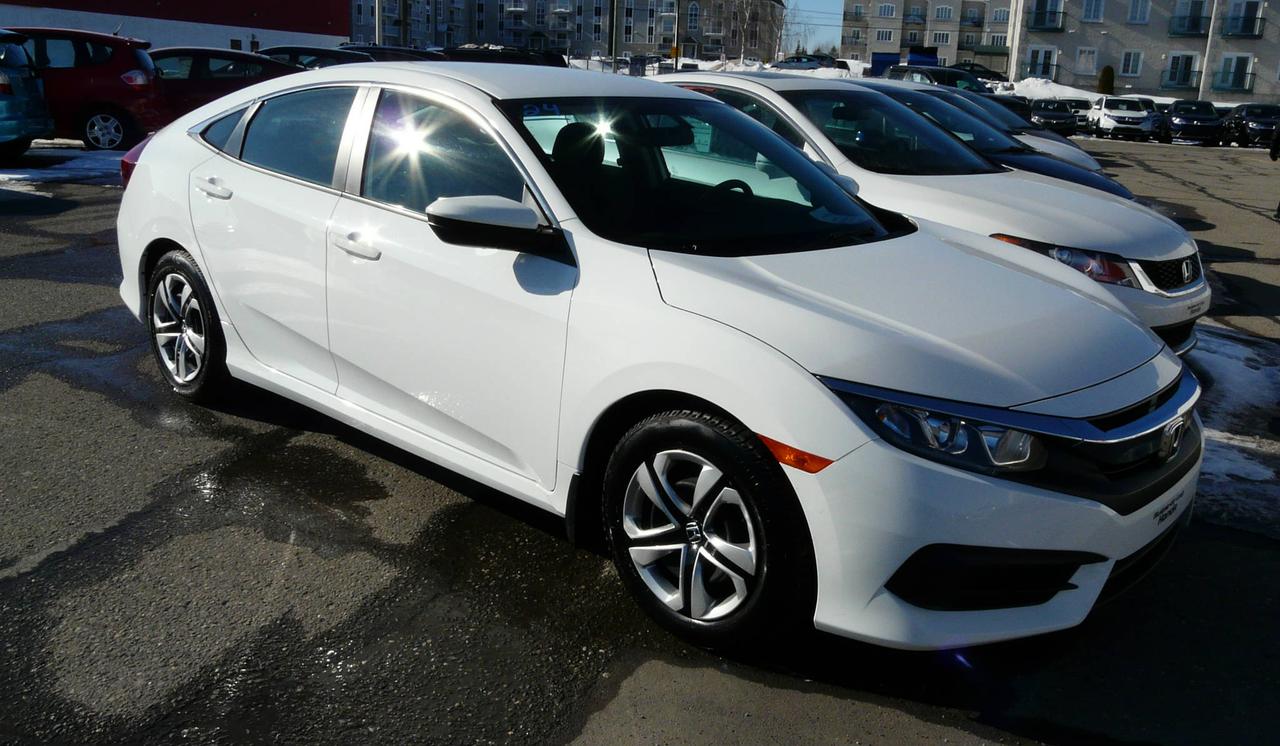<a href=http://www.rivieredulouphonda.com/occasion/Honda-Civic-2016.html>http://www.rivieredulouphonda.com/occasion/Honda-Civic-2016.html</a>

Honda Civic 4 portes, boîte manuelle, LX