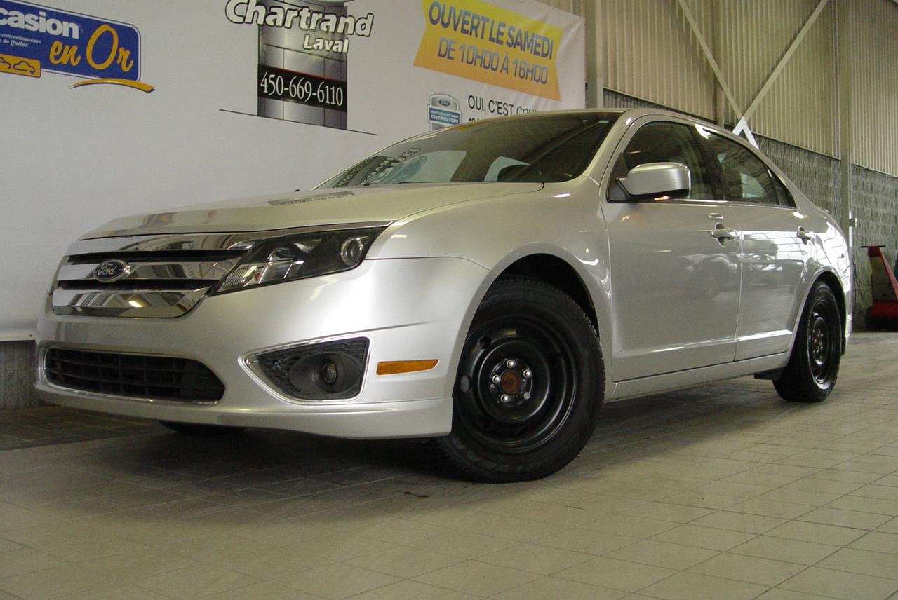 <a href=https://www.chartrandford.com/occasion/Ford-Fusion-2012.html>https://www.chartrandford.com/occasion/Ford-Fusion-2012.html</a>

La Fusion est connue pour son style audacieux, son excellente tenue de route et sa sécurité exceptionnelle. Ajoutez-y une superbe économie de carburant, des technologies intelligentes et des cotes maximales de qualité et de satisfaction.  Ainsi, on comprend facilement pourquoi la Fusion est privilégiée par les acheteurs.

La Ford Fusion SEL que nous vous proposons ici est propulsée par un V6 de 3 L à carburant mixte générant 240 chevaux.   

Disponible dès maintenant chez Chartrand Ford à Laval à deux pas de Montréal. Les meilleures transactions sont chez Chartrand Ford. Le financement est facile et rapide. Notre équipe dexpert saura répondre à toutes vos questions au 450.669.6110 

VEUIILEZ NOTER:

Sur cette  Fusion SEL vous retrouverez 4 pneus dhiver sur jantes dacier ainsi que 4 pneus dété sur jantes an alliage.