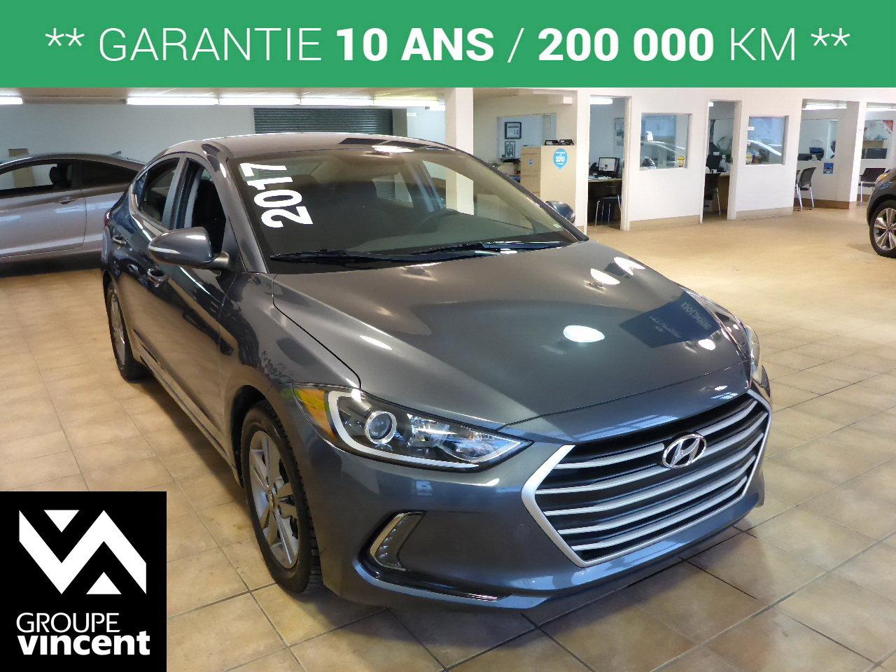 <a href=https://www.autoaubaine.com/Hyundai-Elantra-c6981198.html>https://www.autoaubaine.com/Hyundai-Elantra-c6981198.html</a>

Hyundai Elantra GL**Si?ges chauffants** Confortable et fiable ! 2017Régulateur de vitesse, Essuie-glaces intermittents, Anti-démarreur, Freins ABS, Contrôle de stabilité, Coussin gonflable conducteur, Coussins gonflables latéraux, Lecteur MP3, 6 Haut-parleurs, Portes électriques, Tachymètre, Vitres électriques, Air climatisé, Commandes audio au volant, Sièges arrières rabattables, Sièges chauffants, Volant ajustable, Tapis protecteurs, Phares haute intensité, Ordinateur de bord, Caméra de recul, Radio AM/FM, Rétroviseur électrique, Direction assistée, Télédéverrouillage, Rétroviseurs chauffants, Banquette arrière divisé, Coussins gonflables arrière pour la tête, Démarrage sans clé, Sièges chauffants - Avant, Rétroviseurs électriques, Jantes en alliage, Antipatinage, Phares antibrouillards, Verrous de sécurité pour enfants, Système de surveillance de la pression des pneus, Sièges baquets, Prise Auxiliaire, Port USB