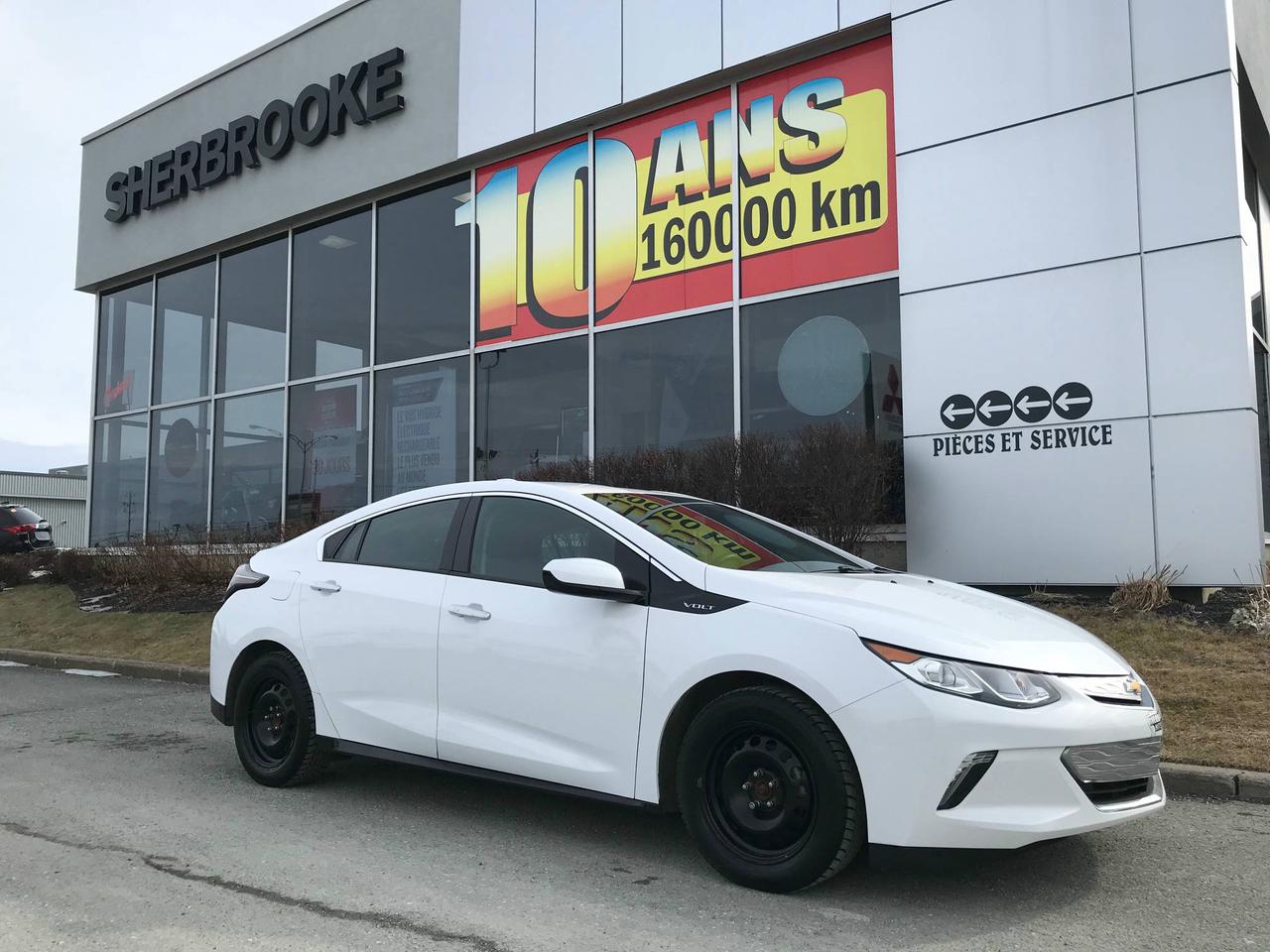 <a href=https://www.sherbrookemitsubishi.com/occasion/Chevrolet-Volt-2017.html>https://www.sherbrookemitsubishi.com/occasion/Chevrolet-Volt-2017.html</a>

WOW!!! CHEVROLET VOLT HYBRIDE!!! A SEULEMENT 27997$ + TX.!! FAITES VITE!!!
Rapport dhistorique Carproof disponible.

Ouvert le samedi de 10h à 16h. 

Pour une expérience dachat et un service des plus agréable cest Sherbrooke Mitsubishi, membre de lÉquipe Précision Auto. Visiter notre site web equipeprecisionauto.ca pour voir tout notre inventaire de véhicules usagés. Plus de 100 véhicules usagés de toute marque au même endroit.

Situé en Estrie à Sherbrooke et Magog, près de Granby et Bromont.

Venez voir notre inventaire nous achetons et vendons des voitures doccasions de toutes marque.

Informez-vous auprès de nos conseillés qualifiés pour connaitre nos Programmes de Financement EN LIGNE Avantageux!

Le paiement de $ 110 / semaine est basé sur un prix de vente de $27997 avec $0 comptant sur un terme de 84 mois avec un taux dintérêt de 5.49% (taux peut varier). Le paiement inclus les intérêts et le capital (taxes incluses). Les immatriculations et les assurances-prêt sont en sus. Le tout sur approbation du crédit. Les taux et termes sont à titre indicatif seulement.

Frais administratif de 599$ pour la garantie 1 an incluse, Protection Plus Sherbrooke Mitsubishi.