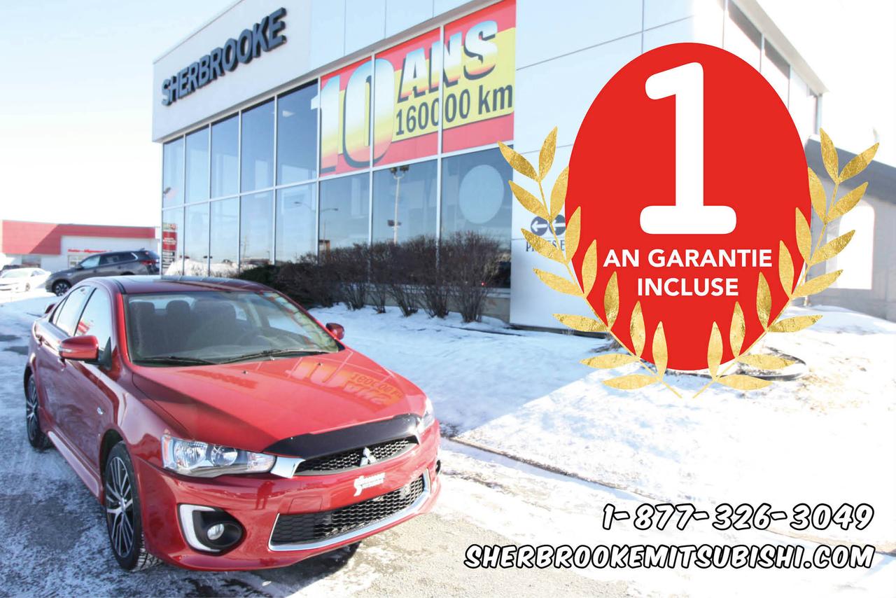 <a href=https://www.sherbrookemitsubishi.com/occasion/Mitsubishi-Lancer-2016.html>https://www.sherbrookemitsubishi.com/occasion/Mitsubishi-Lancer-2016.html</a>

**DÉMO RABAIS DE 7,000$** NEUF, TRÈS FAIBLE KILOMÉTRAGE, Toît ouvrant, Caméra de Recul, Sièges chauffants, Commandes audio au volant, Bluetooth, A/C, Vitres Électriques, Cuir sur le volant, Aileron, et bien plus encore... À Voir !!

**PRIX DÉTAIL 26,995$ -7,005$ = 19,990$**GARANTIE COMPLÈTE motopropulseur 10 ans / 160 000 km. Garantie générale 5 ans / 100 000 km.

**1-877-326-3049**

Rapport dhistorique Carproof disponible.

Ouvert le samedi de 10h à 16h. 

Pour une expérience dachat et un service des plus agréable cest Sherbrooke Mitsubishi, membre de lÉquipe Précision Auto. Visiter notre site web sherbrookemitsubishi.com ou equipeprecisionauto.ca pour voir tout notre inventaire de véhicules usagés. Plus de 100 véhicules usagés de toute marque au même endroit.

Situé en Estrie à Sherbrooke et Magog, près de Granby et Bromont.

Venez voir notre inventaire nous achetons et vendons des voitures doccasions de toutes marque.

Informez-vous auprès de nos conseillés qualifiés pour connaitre nos Programmes de Financement EN LIGNE Avantageux!

Frais administratif de 599$ pour la garantie 1 an incluse, Protection Plus Sherbrooke Mitsubishi.