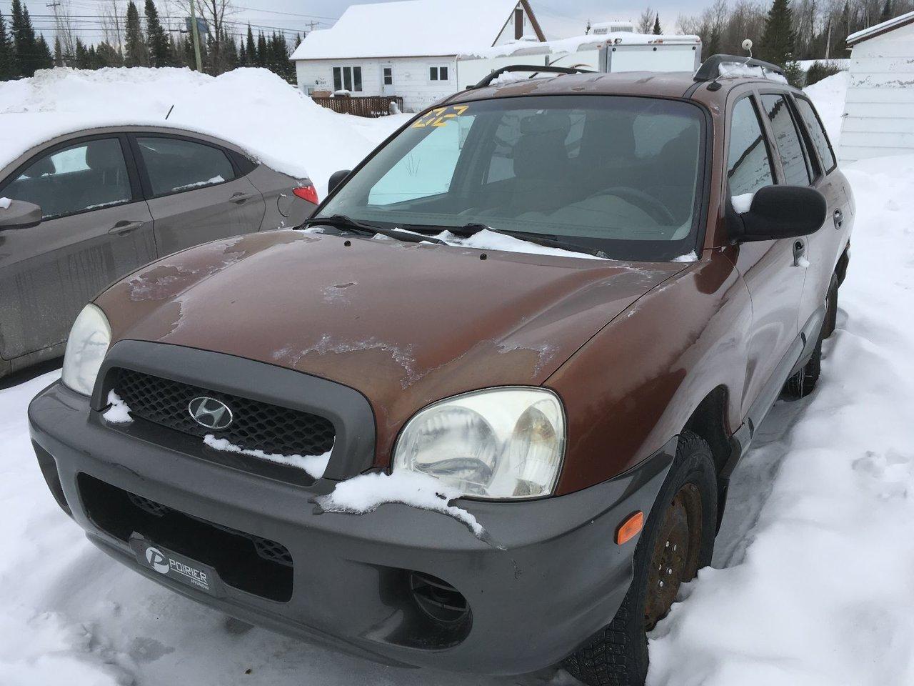<a href=https://www.poirierhyundai.ca/occasion/Hyundai-Santa_Fe-2002.html>https://www.poirierhyundai.ca/occasion/Hyundai-Santa_Fe-2002.html</a>

Hyundai Santa Fe GL  2002Régulateur de vitesse, Essuie-glaces intermittents, Coussin gonflable conducteur, Lecteur CD, Lampes de lecture arrière, Volant ajustable, Rétroviseur électrique, Direction assistée, Rétroviseurs chauffants, Sièges tissu, Freins à disque, Phares antibrouillards, Verrous de sécurité pour enfants, Sièges baquets, Roue de secours - Temporaire, Aluminium, Climatisation