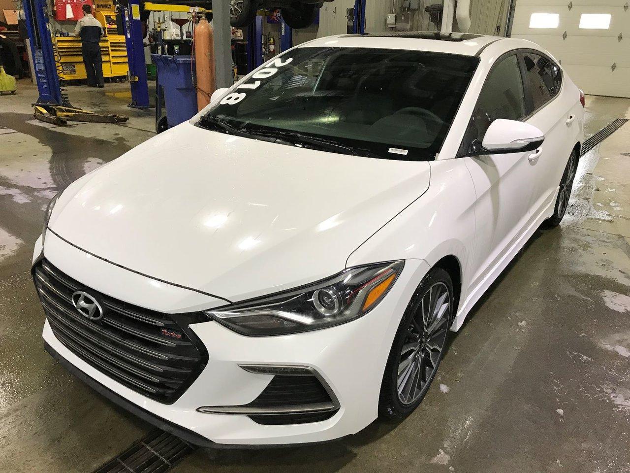 <a href=https://www.poirierhyundai.ca/occasion/Hyundai-Elantra-2018.html>https://www.poirierhyundai.ca/occasion/Hyundai-Elantra-2018.html</a>

Hyundai Elantra SPORT TURBO APPLE CAR PLAY 2018Régulateur de vitesse, Toit ouvrant, Essuie-glaces intermittents, Anti-démarreur, Freins ABS, Contrôle de stabilité, Coussin gonflable conducteur, Coussins gonflables latéraux, Lecteur MP3, Intérieur en cuir, Volant ajustable, Moonroof, Tapis protecteurs, Caméra de recul, Volant gainé de cuir, Phares automatiques, Rétroviseur électrique, Direction assistée, Rétroviseurs chauffants, Coussins gonflables arrière pour la tête, Démarrage sans clé, Freins à disque, Sièges chauffants - Avant, Antipatinage, Verrous de sécurité pour enfants, Système de surveillance de la pression des pneus, Sièges baquets, Technologie Bluetooth intégrée, Surveillance de langle mort, Aluminium, Climatisation, Volant chauffant