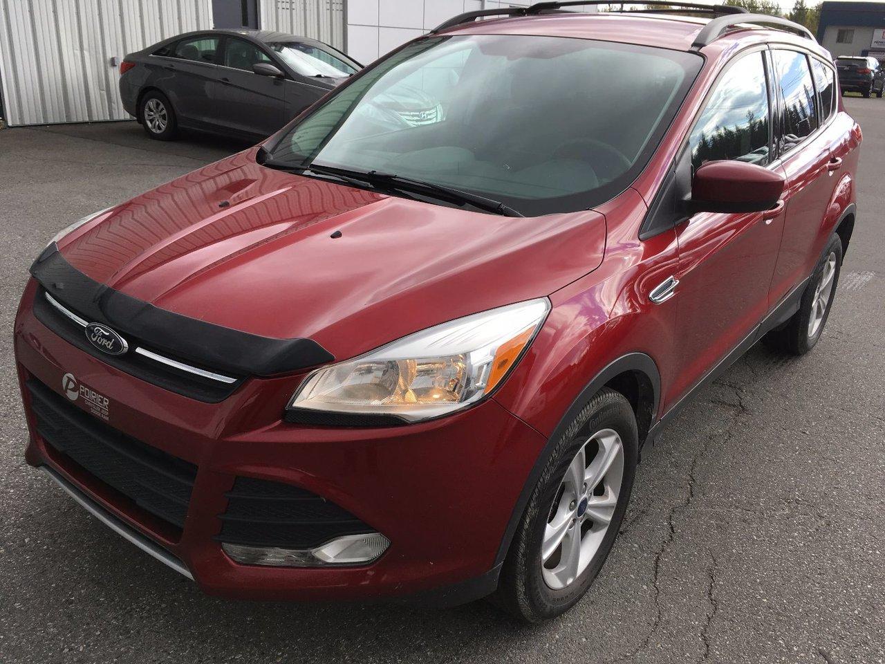 <a href=https://www.poirierhyundai.ca/occasion/Ford-Escape-2014.html>https://www.poirierhyundai.ca/occasion/Ford-Escape-2014.html</a>

Ford Escape SE 4WD ECO BOOST  CAM?RA Pneus d\Hiver inclus 2014Régulateur de vitesse, Essuie-glaces intermittents, Anti-démarreur, Freins ABS, Contrôle de stabilité, Coussin gonflable conducteur, Coussins gonflables latéraux, Lecteur CD, Lecteur MP3, Volant ajustable, Tapis protecteurs, Caméra de recul, Phares automatiques, Rétroviseur électrique, Direction assistée, Coussins gonflables arrière pour la tête, Freins à disque, Sièges chauffants - Avant, Antipatinage, Phares antibrouillards, Verrous de sécurité pour enfants, Système de surveillance de la pression des pneus, Sièges baquets, Technologie Bluetooth intégrée, Climatisation