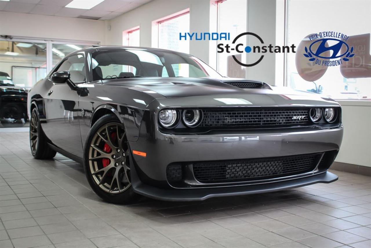 <a href=https://www.hyundaistconstant.com/occasion/Dodge-Challenger-2017.html>https://www.hyundaistconstant.com/occasion/Dodge-Challenger-2017.html</a>

-- JAMAIS ACCIDENTE  -- BAS KILOMETRAGE   -- SYSTEME DE SON HARMAN/KARDON  -- TOIT OUVRANT  -- SYSTEME DE NAVIGATION ( GPS )  -- CAMERA DE RECUL  -- CAPTEUR DANGLE MORT  -- SYSTEME MAIN LIBRE ( BLUETOOTH ) + USB, AUXILIAIRE  -- SIEGES CHAUFFANTS EN CUIR   -- SIEGES ELECTRIQUES   -- VOLANT CHAUFFANT  -- AIR CLIMATISE ( A/C )  -- REGULATION DE TEMPERATURE PAR ZONE   -- VITRES ELECTRIQUES  -- MIROIRS ELECTRIQUES  -- REGULATEUR DE VITESSE     -- MOTEUR V8 HEMI SUPERCHARGED 6.2L  -- MAG 20  -- PROPULSION  -- FINANCEMENT DISPONIBLE  *** OUVERT DU LUNDI AU SAMEDI ***  ***Frais de 399$ sapplique***  *** Le prix indiqué est conditionnel au financement, minimum 6 mois ***    -- ACCIDENT FREE  -- LOW MILEAGE   -- HARMAN/KARDON SOUND SYSTEM  -- SUNROOF  -- NAVIGATION SYSTEM ( GPS )  -- BACK UP CAMERA  -- BLIND SPOT SENSOR  -- SYSTEM HANDS FREE ( BLUETOOTH) + USB AND AUXILIARY  -- LEATHER HEATING SEATS   -- ELECTRIC SEATS AJUSTABLE  -- HEATED STEERING WHEEL  -- AIR CONDITIONING ( A/C )  -- TEMPERATURE REGULATION BY AREA   -- ELECTRIC WINDOWS  -- ELECTRIC MIRRORS  -- CRUISE CONTROL    -- 6.2L V8 HEMI SUPERCHARGED ENGINE  -- MAG 20  -- REAR-WHEEL DRIVE  -- FINANCING AVAILABLE  *** OPEN MONDAY TO SATURDAY ***  ***Fees of 399$ apply***  *** The price indicated is conditional on the financing, minimum 6 months ***    * Nous avons le plus grand inventaire Hyundai doccasion en Montérégie. Nous sommes ouverts du Lundi au Vendredi de 9h a 21H et le Samedi de 10h a 16h.     We have the largest used Hyundai inventory in Montérégie. We are open from Monday to Friday from 9am to 9pm and Saturday from 10am to 4pm.