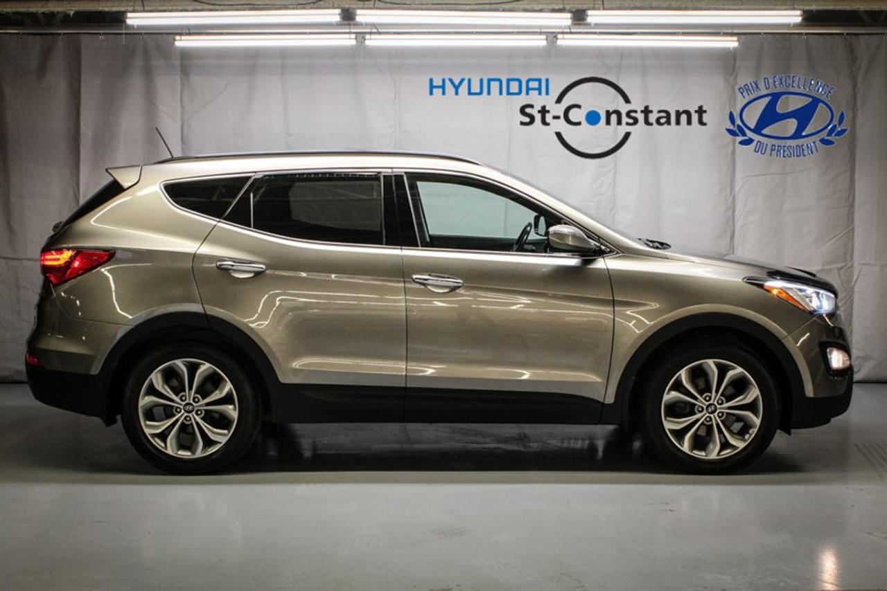 <a href=https://www.hyundaistconstant.com/occasion/Hyundai-Santa_Fe_Sport-2015.html>https://www.hyundaistconstant.com/occasion/Hyundai-Santa_Fe_Sport-2015.html</a>

-- JAMAIS ACCIDENTEE    -- BAS KILOMETRAGE     -- SYSTEME DE SON INFINITY    -- TOIT OUVRANT PANORAMIQUE    -- SYSTEME DE NAVIGATION ( GPS )    -- CAMERA DE RECUL    -- SYSTEME DASSISTANCE AU STATIONNEMENT / CAPTEUR DE MOUVEMENT    -- SYSTEME MAIN LIBRE ( BLUETOOTH ) + USB, AUXILIAIRE    -- SIEGES CHAUFFANTS EN CUIR AVANT/ARRIERE    -- VOLANT CHAUFFANT     -- SIEGES ELECTRIQUES    -- REGULATION DE TEMPERATURE PAR ZONE     -- REGULATEUR DE VITESSE    -- MIROIR ELECTRIQUE         -- MOTEUR 2.0L TURBO    -- MAG 17    -- 4X4 / AWD    -- FINANCEMENT DISPONIBLE    *** OUVERT DU LUNDI AU SAMEDI ***    ***Frais de 399$ sapplique***    *** Le prix indiqué est conditionnel au financement, minimum 6 mois ***      -- ACCIDENT FREE    -- LOW MILEAGE     -- INFINITY SOUND SYSTEM    -- PANORAMIC SUNROOF    -- NAVIGATION SYSTEM ( GPS )    -- BACK UP CAMERA    -- PARKING ASSISTANCE SYSTEM / MOVEMENT SENSOR    -- SYSTEM HANDS FREE ( BLUETOOTH) + USB AND AUXILIARY     -- LEATHER HEATING SEATS FRONT/BACK    -- HEATED STEERING WHEEL    -- ELECTRIC SEAT     -- TEMPERATURE REGULATION BY AREA     -- CRUISE CONTROL     -- ELECTRIC MIRROR        -- 2.4L ENGINE    -- MAG 17    -- 4X4 / AWD    -- FINANCING AVAILABLE    *** OPEN MONDAY TO SATURDAY ***    ***Fees of 399$ apply***    *** The price indicated is conditional on the financing, minimum 6 months ***      * Nous avons le plus grand inventaire Hyundai doccasion en Montérégie. Nous sommes ouverts du Lundi au Vendredi de 9h a 21H et le Samedi de 10h a 16h.         We have the largest used Hyundai inventory in Montérégie. We are open from Monday to Friday from 9am to 9pm and Saturday from 10am to 4pm.