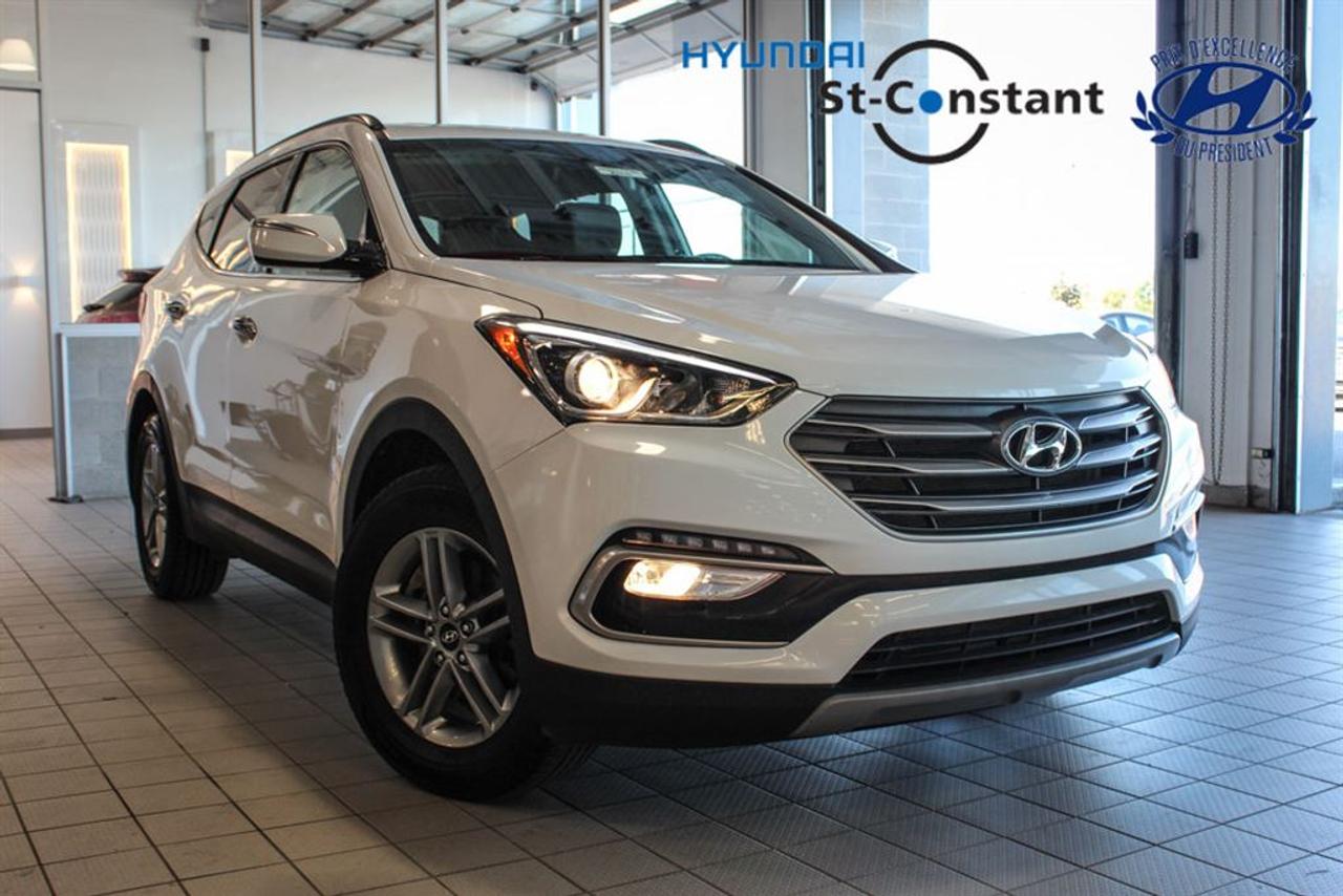 <a href=https://www.hyundaistconstant.com/occasion/Hyundai-Santa_Fe_Sport-2018.html>https://www.hyundaistconstant.com/occasion/Hyundai-Santa_Fe_Sport-2018.html</a>

-- JAMAIS ACCIDENTEE    -- CAMERA DE RECUL    -- SYSTEME DASSISTANCE AU STATIONNEMENT / CAPTEUR DE MOUVEMENT    -- SYSTEME MAIN LIBRE ( BLUETOOTH ) + USB, AUXILIAIRE    -- SIEGES CHAUFFANTS AVANT/ARRIERE    -- VOLANT CHAUFFANT    -- SIEGES ELECTRIQUES    -- REGULATION DE TEMPERATURE PAR ZONE     -- REGULATEUR DE VITESSE    -- MIROIR ELECTRIQUE         -- MOTEUR 2.4L    -- MAG 17    -- 4X4 / AWD    -- FINANCEMENT DISPONIBLE    *** OUVERT DU LUNDI AU SAMEDI ***    ***Frais de 399$ sapplique***    *** Le prix indiqué est conditionnel au financement, minimum 6 mois ***      -- ACCIDENT FREE    -- BACK UP CAMERA    -- PARKING ASSISTANCE SYSTEM / MOVEMENT SENSOR    -- SYSTEM HANDS FREE ( BLUETOOTH) + USB AND AUXILIARY     -- HEATED SEATS FRONT/BACK    -- HEATED STEERING WHEEL    -- ELECTRIC SEAT     -- TEMPERATURE REGULATION BY AREA     -- CRUISE CONTROL     -- ELECTRIC MIRROR        -- 2.4L ENGINE    -- MAG 17    -- 4X4 / AWD    -- FINANCING AVAILABLE    *** OPEN MONDAY TO SATURDAY ***    ***Fees of 399$ apply***    *** The price indicated is conditional on the financing, minimum 6 months ***      * Nous avons le plus grand inventaire Hyundai doccasion en Montérégie. Nous sommes ouverts du Lundi au Vendredi de 9h a 21H et le Samedi de 10h a 16h.         We have the largest used Hyundai inventory in Montérégie. We are open from Monday to Friday from 9am to 9pm and Saturday from 10am to 4pm.