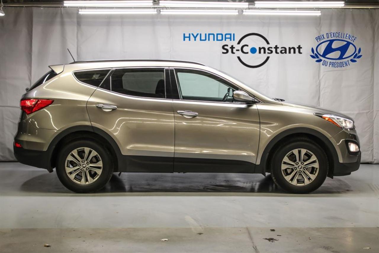 <a href=https://www.hyundaistconstant.com/occasion/Hyundai-Santa_Fe_Sport-2014.html>https://www.hyundaistconstant.com/occasion/Hyundai-Santa_Fe_Sport-2014.html</a>

-- JAMAIS ACCIDENTEE    -- SYSTEME MAIN LIBRE ( BLUETOOTH ) + USB, AUXILIAIRE    -- SYSTEME DASSISTANCE AU STATIONNEMENT / CAPTEUR DE MOUVEMENT    -- AIR CLIMATISE ( A/C )    -- SIEGES CHAUFFANTS AVANT/ARRIERE    -- VOLANT CHAUFFANT    -- REGULATEUR DE VITESSE    -- VITRES ELECTRIQUES    -- MIROIRS ELECTRIQUE S        -- MOTEUR 2.4L    -- 4X4 / AWD    -- FINANCEMENT DISPONIBLE    *** OUVERT DU LUNDI AU SAMEDI ***    ***Frais de 399$ sapplique***    *** Le prix indiqué est conditionnel au financement, minimum 6 mois ***      -- ACCIDENT FREE    -- SYSTEM HANDS FREE ( BLUETOOTH) + USB AND AUXILIARY     -- PARKING ASSISTANCE SYSTEM / MOVEMENT SENSOR    -- AIR CONDITIONING ( A/C )    -- HEATED SEATS FRONT/REAR    -- HEATED STEERING WHEEL    -- CRUISE CONTROL     -- ELECTRIC WINDOWS    -- ELECTRIC MIRRORS        -- 2.4L ENGINE    -- 4X4 / AWD    -- FINANCING AVAILABLE    *** OPEN MONDAY TO SATURDAY ***    ***Fees of 399$ apply***    *** The price indicated is conditional on the financing, minimum 6 months ***      * Nous avons le plus grand inventaire Hyundai doccasion en Montérégie. Nous sommes ouverts du Lundi au Vendredi de 9h a 21H et le Samedi de 10h a 16h.         We have the largest used Hyundai inventory in Montérégie. We are open from Monday to Friday from 9am to 9pm and Saturday from 10am to 4pm.