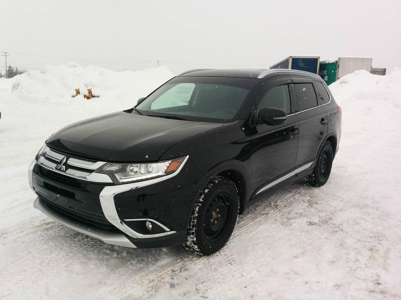 <a href=https://www.letoiledodge.com/occasion/Mitsubishi-Outlander-2017.html>https://www.letoiledodge.com/occasion/Mitsubishi-Outlander-2017.html</a>

MOTEUR 4 CYLINDRES-4WD-BLUETOOH-VOLANT CHAUFFANT-DÉTECTEUR VÉHICULE ANGLES MORTS-COMMANDE AU VOLANT-ATTELAGE DE REMORQUE-COMMANDE AU VOLANT-SIÈGES CHAUFFANTS-CRUISE CONTROL -SYSTÈME ANTI PATINAGE -CLIMATISATION 2 ZONES-SIÈGES EN CUIR CHAUFFANTS-TOIT OUVRANT ÉLECTRIQUE.LÉtoile Dodge Chrysler est un concessionnaire 5 étoiles situé à Saguenay (Jonquière). À 10 kilomètres de Chicoutimi et 30 kilomètres dAlma (Lac St-Jean). Nous avons un vaste inventaire pour combler tous vos besoins; que ce soit un camion avec moteur V8, V6 ou Diesel, VUS, berline, compacte, familiale, AWD, 4x4, sportive, convertible ou minifourgonnette.
Nous offrons également du crédit 2e ou 3e chance. 
Visitez notre salle de montre virtuelle au : www.letoiledodge.ca