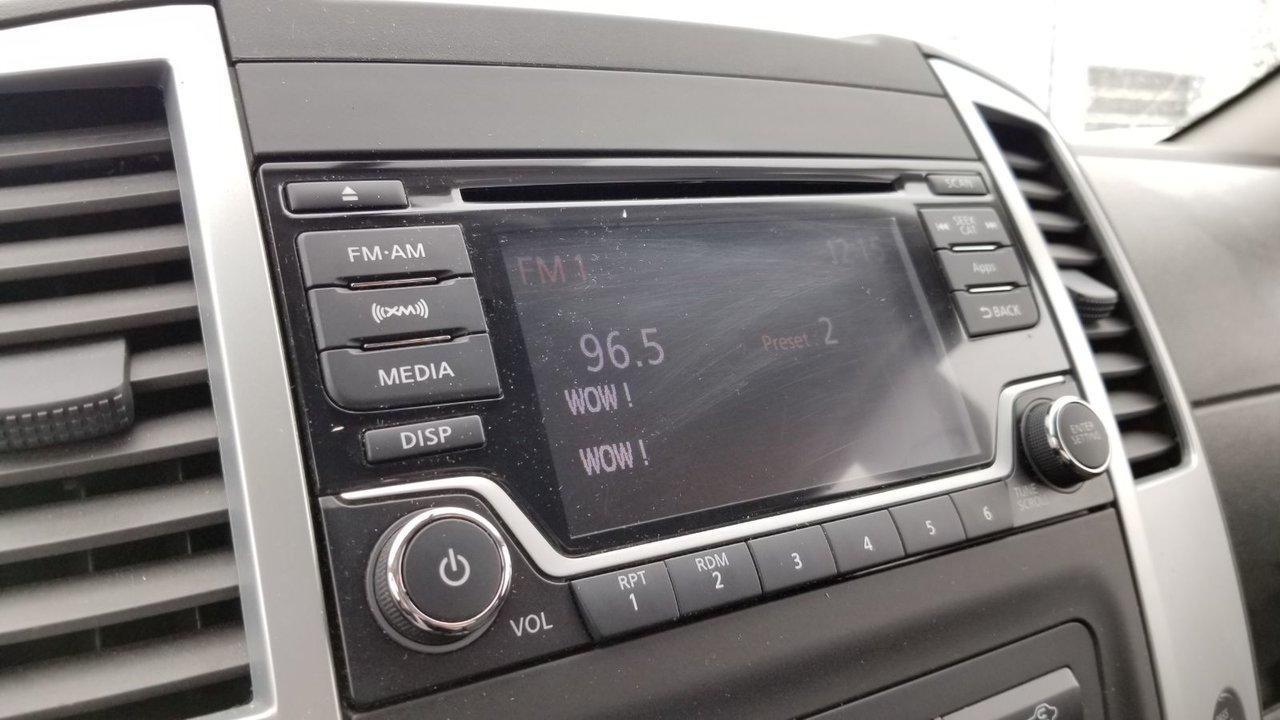 669164.11795611