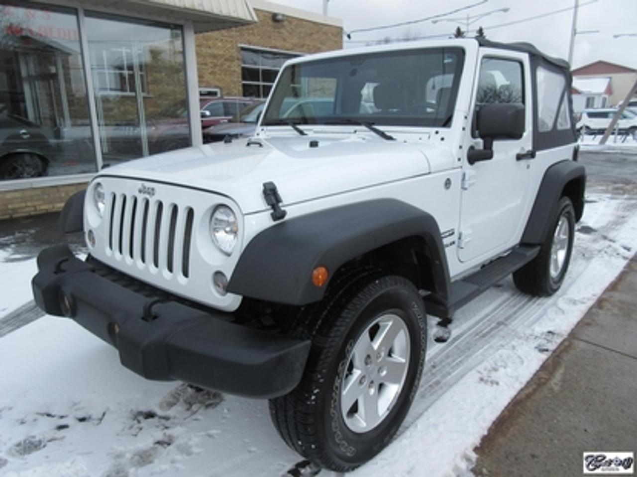 <a href=https://www.autoaubaine.com/Jeep-Wrangler-c7028412.html>https://www.autoaubaine.com/Jeep-Wrangler-c7028412.html</a>

Jeep Wrangler Sport 2014\n\nRégulateur de vitesse, Essuie-glaces intermittents, Anti-démarreur, Freins ABS, Contrôle de stabilité, Coussin gonflable conducteur, Lecteur CD, Lecteur MP3, Chauffe-moteur, Tachymètre, Commandes audio au volant, Sièges arrières rabattables, Volant ajustable, Marchepieds, Tapis protecteurs, Attelage remorque, Ordinateur de bord, Radio AM/FM, Direction assistée, Jantes en alliage, Antipatinage, Phares antibrouillards, Système de surveillance de la pression des pneus, Sièges baquets\n\nSuperbe Jeep, 4 PNEUS HIVER SUR RIMS INCLUS, mags, marchepieds, attache-remorque, ratio du différentiel de 3.73, bas kilométrage, 1 seul proprio (55 ans), bien entretenu, freins comme neufs, faut voir!!!  Carproof disponible, aucun accident...

BALANCE DE GARANTIE JEEP JUSQUAU 29 JUILLET 2019 OU 100000 KM SUR GR. MOTOPROPULSEUR!!!

*****TEXTOS BIENVENUE 514 707-4090*****

CHAPUT AUTO CONCESSIONNAIRE CHRYSLER JEEP RAM À VARENNES DEPUIS PLUS DE 65 ANS. TOUS NOS VÉHICULES SONT INSPECTÉS, RÉPARÉS ET GARANTIS. FINANCEMENT RAPIDE SUR PLACE 2 IÈME ET 3 IÈME CHANCE AU CRÉDIT, AUCUN CAS REFUSÉ.  

     WWW.CHAPUTOCCASION.COM

SBELLEMARE@CHAPUTAUTOMOBILE.COM

*****OUVERT LE SAMEDI DE 10H À 16H*****