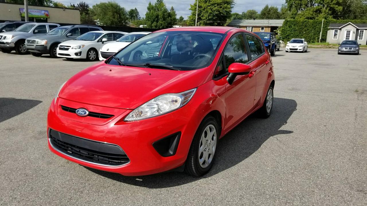 <a href=https://www.autoaubaine.com/Ford-Fiesta-c6895587.html>https://www.autoaubaine.com/Ford-Fiesta-c6895587.html</a>

Ford Fiesta 2012, automatique, 124,200km, groupe électrique, air climatisé, tout équipé!

Ce véhicule se situe au 13459 Boulevard Curé Labelle à Mirabel.

Nos emplacements situés à Laval et à Mirabel vous offrent tous les soins requis pour votre nouveau véhicule sous un même toit : Mécanique à taux réduit si vous achetez un véhicule chez nous, des rabais sur lesthétique ainsi la teinte de vitres, débosselage sans peinture, carrosserie, remplacement de pare-brise et bien plus.

Tous nos véhicules ont un rapport dinspection détaillé, sont soigneusement préparés.

Nous vous offrons le financement 1ère, 2ème et 3ème chance au crédit ainsi que la politique du meilleur prix garanti !

Osez comparer. Avant dacheter venez rencontrer notre personnel dynamique dans un environnement sans pression. Notre mission est de vous trouver le véhicule de votre choix, selon vos critères ! Si nous ne lavons pas, nous pouvons vous le trouver ! Frais de préparation en sus.

Se habla Español !
