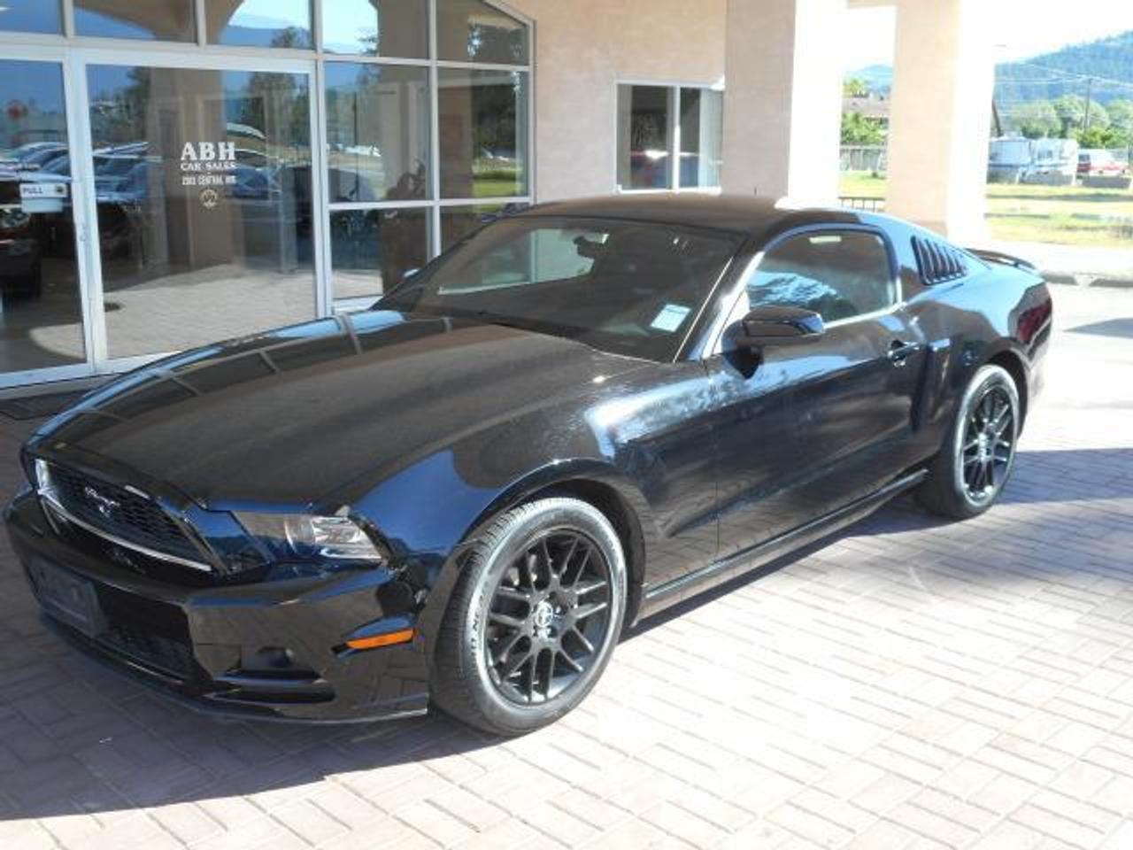 2014 Ford Mustang. Clean car! Awesome options on this beauty. Appearance pkg that includes GT rear spoiler and 18inch black wheels. Also has the awesome recaro cloth seats from factory as well as the GT coupe accessory pkg with window louvers and side vents. Powerful V6 with 305HP! Come see it now! ABH Car Sales in Grand Forks proudly serving the Okanagan and region: Kelowna, West Kelowna, Vernon, Penticton, Armstrong, Coldstream, Enderby, Kamloops, Lake Country, Lumby, Merritt, Osoyoos, Oyama, Peachland, Revelstoke, Salmon Arm, Sicamous, Rock Creek, Midway, Nelson, Castlegar, Trail, Cranbrook, Creston, and Summerland. Financing and Extended warranties available.
