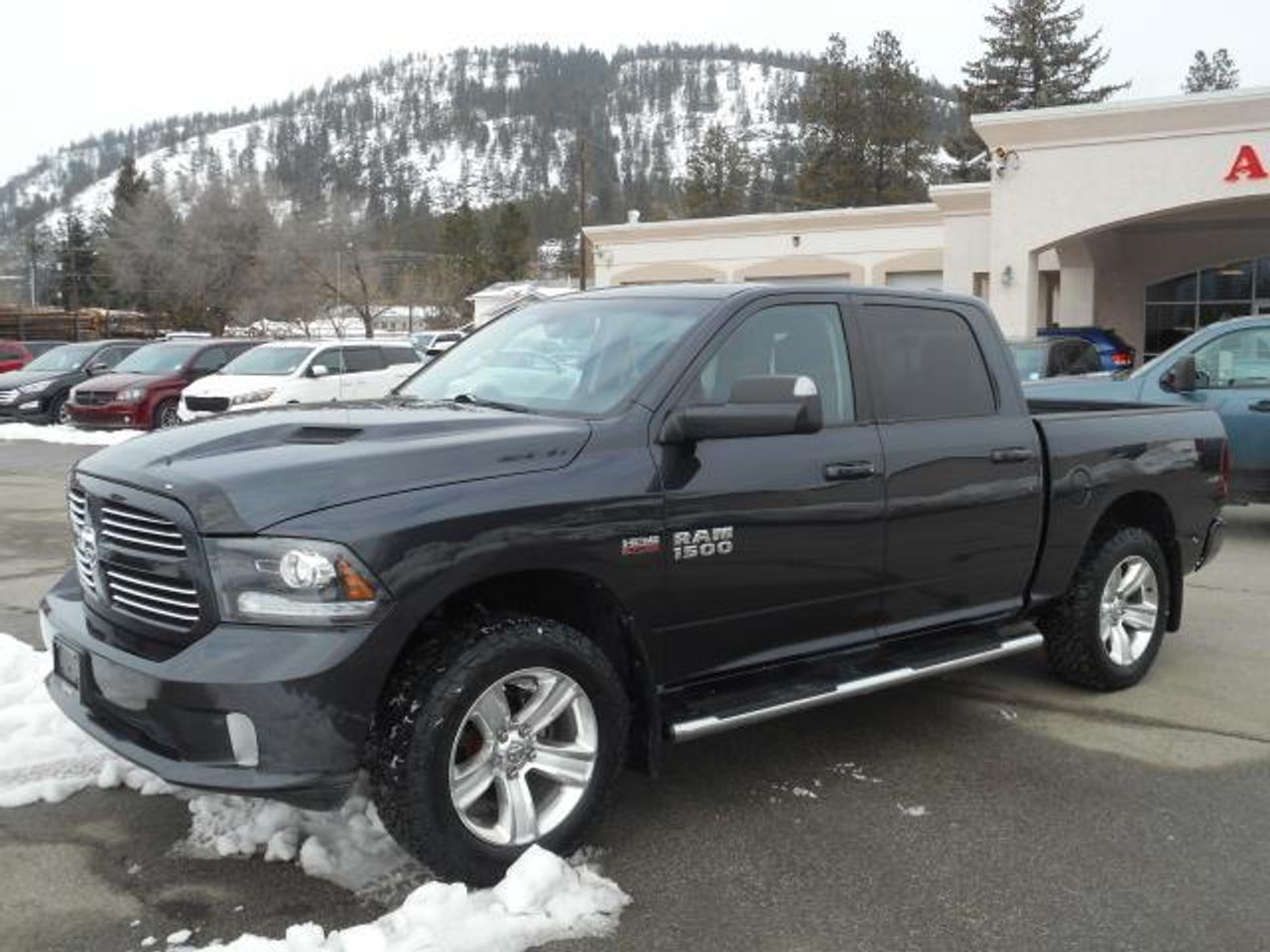 2014 RAM 1500 SPORT CREW 4X4. GORGEOUS TRUCK! Loaded with all the bells and whistles such as the legendary Hemi engine, factory trailer brake, leather heated and cooled seats, sunroof and even has navigation. Even has brand new BFG all terrain tires! Ready for the road. Come check it out today.