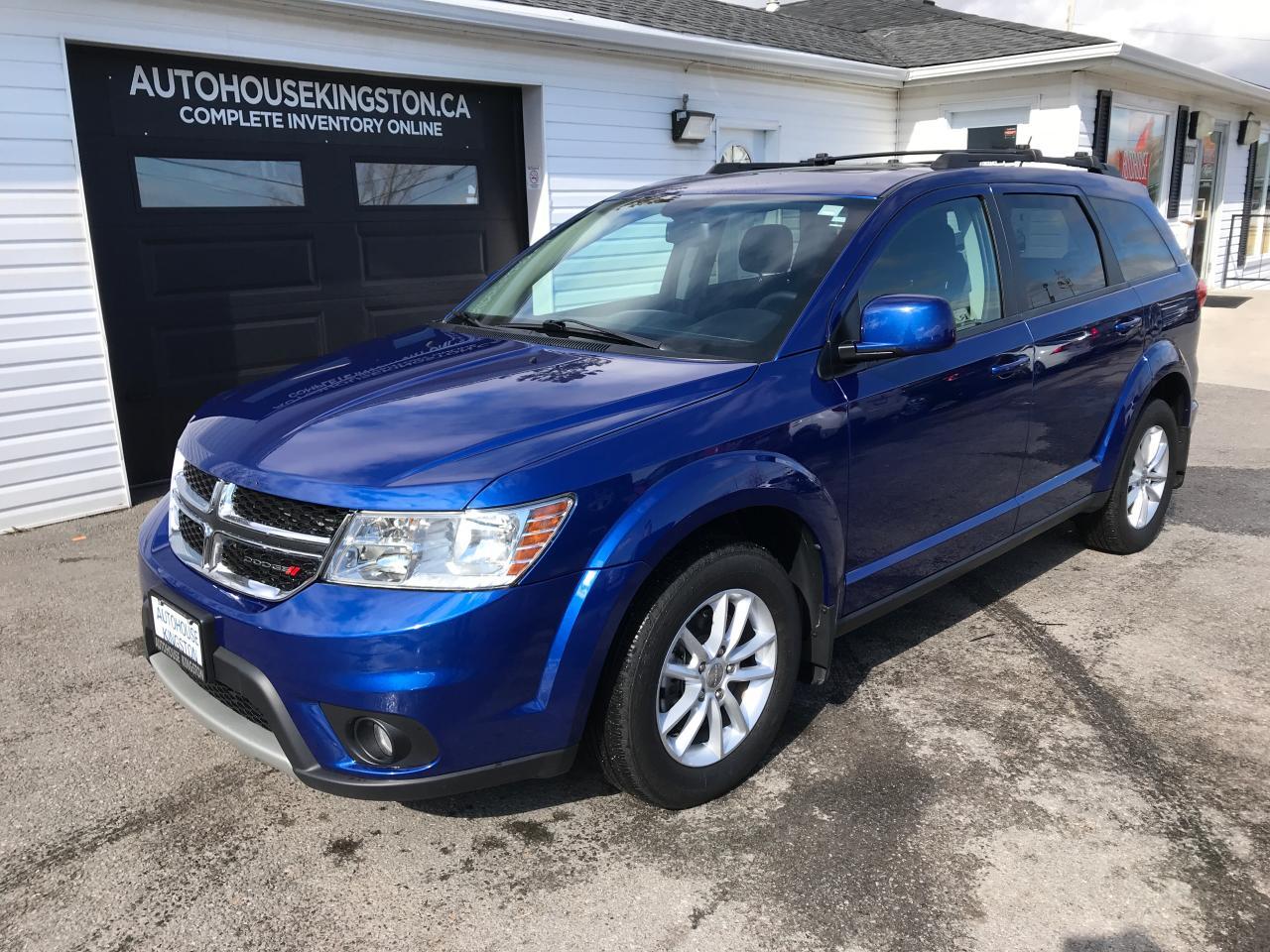<p class=MsoNormal>2015 Dodge Journey SXT</p>
<p class=MsoNormal>Air Conditioning, DVD Entertainment System, GPS Navigation, Power Locks, Power Windows, Sunroof, Alloy Wheels, Trailer Hitch, Cruise Control, Steering Wheel Options, Keyless Entry, Autostart, Automatic Headlights, Tilt Steering, Sirius XM Radio, Aux Port, 4 Wheel Disc Brakes, Dual-Shift Transmission, Luggage Rack , Leather Steering Wheel</p>
<p class=MsoNormal>&nbsp;</p>
<p class=MsoNormal>All of our vehicles are ready to go! They&rsquo;ve been through the shop for a 250-point safety inspection, Oil Change and Emissions Test if needed. Our vehicles have been cleaned inside and out for your viewing pleasure. When you step on our lot you&rsquo;ll notice that everything is priced and has an information sheet on the dash. We make shopping easy and stress free. Our lot is always open so you can view the vehicles yourself in the evening or on Sundays.</p>
<p class=MsoNormal>Autohouse Kingston is a locally owned family business, and have been serving Kingston and surrounding areas for over 25 years. We operate with transparency and family-like service for all our clients. Here at Autohouse Kingston we work with over 20 lenders to get you the best possible finance options. Please ask how you can add warranty and a winter tire package to your monthly payment. Get approved and driving the same day!</p>
<p>&nbsp;</p>
<p class=MsoNormal>We are located 1556 Bath Rd in Kingston. Just East of Gardiners. Come on in for a test drive and speak to the owners, Bradie and Ken Johnston who will look after all your automotive needs with the friendly, low pressure feel you&rsquo;ve been searching for. Drive off with your new ride today! Our office number is 613-634-3262 and our website is https://www.autohousekingston.ca/ If you have questions after hours or on weekends, Feel free to text Bradie at 613-331-1121. Autohouse Kingston &ndash; It just makes sense.&nbsp;&nbsp;</p>