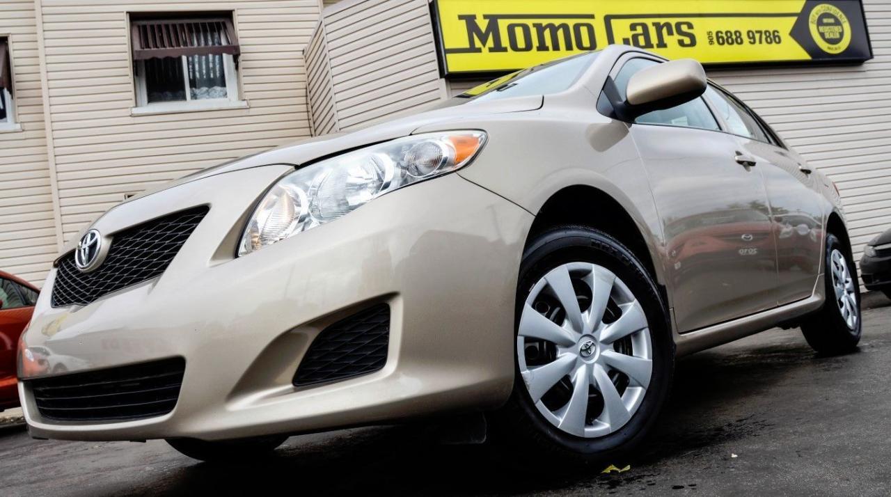 2010 Toyota Corolla CE!

4 Cylinder 1.8L Engine! Keyless Entry + Air Conditioning + Heated Mirrors + Auxiliary Input and so much more!

Meet Abigail! The newest member of the Momo Family! The Toyota Corolla is the textbook compact sedan, the standard by which others are judged. Corolla is the longest continuous nameplate from a Japanese manufacturer, and more than 30 million Corollas have been sold to date in more than 140 countries. The Corolla is inexpensive to buy and operate yet it doesnt feel like a cheap car. It was completely redesigned for the 2009 model year! The Corolla carries over with more safety equipment standard for 2010. This Corolla is easy to drive, with straightforward controls, minimal distractions, and again a comprehensive list of standard safety equipment. Its a hop-in-and-go kind of car, easy to master. And its comfortable. It feels like a small version of a Camry, more like a small car than an econo-box, it?s a big car made small. Corollas are proven to be very reliable cars and are less expensive to insure. We keep trying to get our Sales Pro Geoff to trade in his old Corolla, but he won?t do it. He says the car is just too great to give up. It never goes into the shop, is amazing on gas and built like a tank! You don?t want to miss your chance to drive away in this gorgeous Corolla! Call one of our Sales Professionals today and let?s get the conversation started! 

Here are two awesome facts that you want to know:

1) The Toyota Corolla has one of the MOST RELIABLE Engines in the business and if you do happen to need to purchase parts, Toyota parts are some of the easiest to obtain and cost effective parts to purchase in the market!
	
2) Not only is this a great car to drive, but it will keep you safe too! Safety features that come standard on all Corolla models include six airbags: dual frontal, front side-impact (for torso protection), and side-curtain airbags (for head protection). Antilock Brakes (ABS) are standard, as is Toyotas Vehicle Stability Control with Traction Control.

Fuel Economy: You can drive 50km for approx. $2.69! Rated at 6.92L/100km. Toronto from Niagara for $6.04!

Did You Know? Kiichiro Toyoda, son of the founder of Toyoda Automatic Loom Works, got ideas for the first Toyota cars from the United States. He traveled to the US in 1929 to investigate automobile production because Japan needed to start producing domestic vehicles due to their war with China. Early Toyota?s bear a striking resemblance to the Dodge Power Wagon and Chevrolet.

Finance Abigail Today! ONLY $157.73 Bi-Weekly! With $1,000 down, 3 year loan @ 4.99%! (Sale Price: $9,777 & Cost of borrowing $1,808.28) For well-qualified buyers. Whether youve got perfect credit or blemished we can do it all at Momo Cars! Inquire further as to your specific situation! 

To fill out our online CREDIT APPLICATION please visit:
www.momocars.ca/financing

Financing available for any and every situation. LOW INCOME, BANKRUPTCY, COLLECTIONS AND EVEN O.D.S.P.! We can do it all! From amazing prime rates to subprime! Youll be amazed at the Momo Difference! Dont hesitate to get a risk-free pre-approval today! Vehicle Repossession? Low Income? Student? Newly arrived to Canada? We can do it all!

Call: 905-688-9786
Email: info@momocars.ca
Text: 289-407-2838

Momo Cars Inc
www.MomoCars.ca

Located in Downtown St Catharines. We are a trusted member of the UCDA and licensed by OMVIC. Buy with confidence!

35 Minute Drive from Hamilton & Burlington. 60 Minute Drive from Toronto & Mississauga.