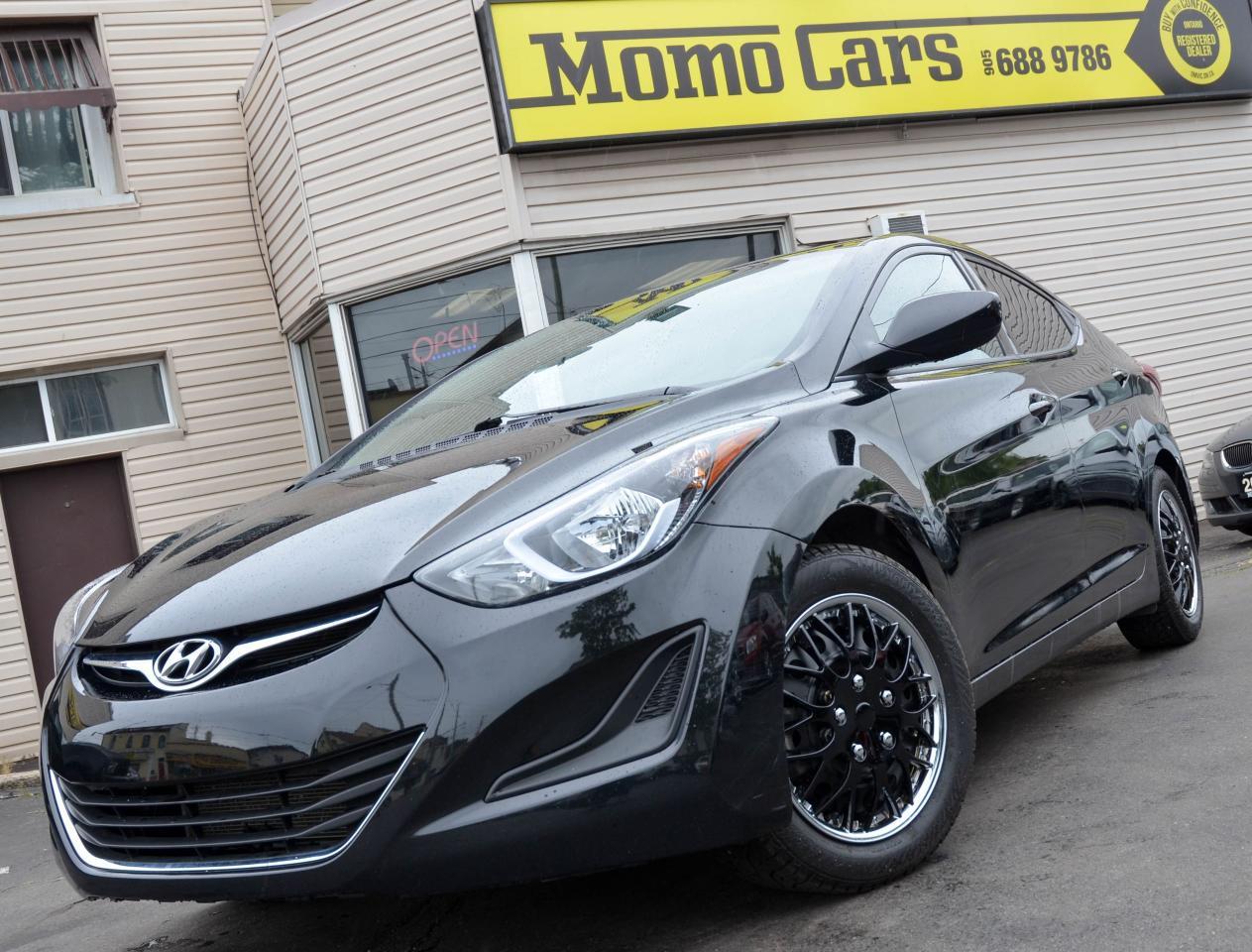 2016 Hyundai Elantra L!

4 Cylinder 1.8L Engine! Manual + Heated Seats + Bluetooth + Cruise Control + Steering Wheel Controls + USB/Auxiliary Inputs + Sirius Satellite Ready + Voice Recognition and so much more!

Meet Miranda! The newest member of the Momo Family! If youve somehow missed the big news about Hyundai in recent years, the new Elantra could come as something of a shock. Long known for products that might have been politely described as cheap and cheerful, Hyundai has shifted gears and is now putting an emphasis on cutting-edge design, segment-leading fuel economy, vastly improved quality and a premium level of content. The 2016 Elantra will definitely not disappoint! Like the two-door Elantra Coupe, also unveiled at the Chicago Auto Show, the new Elantra pushes forward with the design theme Hyundai has dubbed Fluidic Sculpture. First introduced on the bigger Hyundai Sonata, it features soft, flowing curves offset by sharper accent lines. On the Elantra , that means a subtle crease in the sheet metal running from the front of the doors all the way to the rear spoiler of the 5-door hatchback. Compared to the conventional Elantra four-door sedan, Hyundai has made some major changes, putting an emphasis on cutting weight and improving stiffness through the use of ultra-high strength steel. Compared to competing compacts, the 2,784-pound Elantra is 151 pounds lighter than the Mazda3, 175 pounds more svelte than a Ford Focus and a whopping 222 pounds under the heft of the Volkswagen Golf. You won?t want to miss your opportunity to take this beautiful Elantra home! Call one of our Sales Professionals and let?s get the conversation started!

We believe in full disclosure and just wanted to let you know the Hyundai has a former insurance claim of $925.74 from 2017-03-7. Now back to the Elantra!

Here are two awesome facts that you want to know:

1) Appealing to enthusiasts, Hyundai has also added a new selectable steering system that can be adjusted according to a motorists tastes and driving conditions.
	
2) Safety features on all models include front, front-side and side-curtain airbags, and electronic stability control with Vehicle Stability Control, antilock brakes, brake assist, and traction control. GT models get a standard drivers knee airbag.

Fuel Economy: You can drive 50km for approx. $2.78! Rated at 6.19L/100km. Toronto from Niagara for $6.23!

Did You Know? 1975 was marked by the beginning of the company?s export operations. Multiple Ponies were shipped to Ecuador. In 1976, the Hyundai Pony was exported en masse to the Middle East, South America and Africa.

Finance Miranda Today! ONLY $99.95 Bi-Weekly! With $1000 down, 6 year loan @ 4.99%! (Sale Price: $13388 & Cost of borrowing $2,690.73) For well-qualified buyers. Whether youve got perfect credit or blemished we can do it all at Momo Cars! Inquire further as to your specific situation! 
To fill out our online CREDIT APPLICATION please visit:
www.momocars.ca/financing

Financing available for any and every situation. LOW INCOME, BANKRUPTCY, COLLECTIONS AND EVEN O.D.S.P.! We can do it all! From amazing prime rates to subprime! Youll be amazed at the Momo Difference! Dont hesitate to get a risk-free pre-approval today! Vehicle Repossession? Low Income? Student? Newly arrived to Canada? We can do it all! Down Payment May Be Required!

Call ahead to one of our experienced Sales Professionals as this one won?t last long!

Call: 905-688-9786
Email: info@momocars.ca
Text: 289-407-2838

Momo Cars Inc
www.MomoCars.ca

Located in Downtown St Catharines. We are a trusted member of the UCDA and licensed by OMVIC. Buy with confidence!

35 Minute Drive from Hamilton & Burlington. 60 Minute Drive from Toronto & Mississauga.