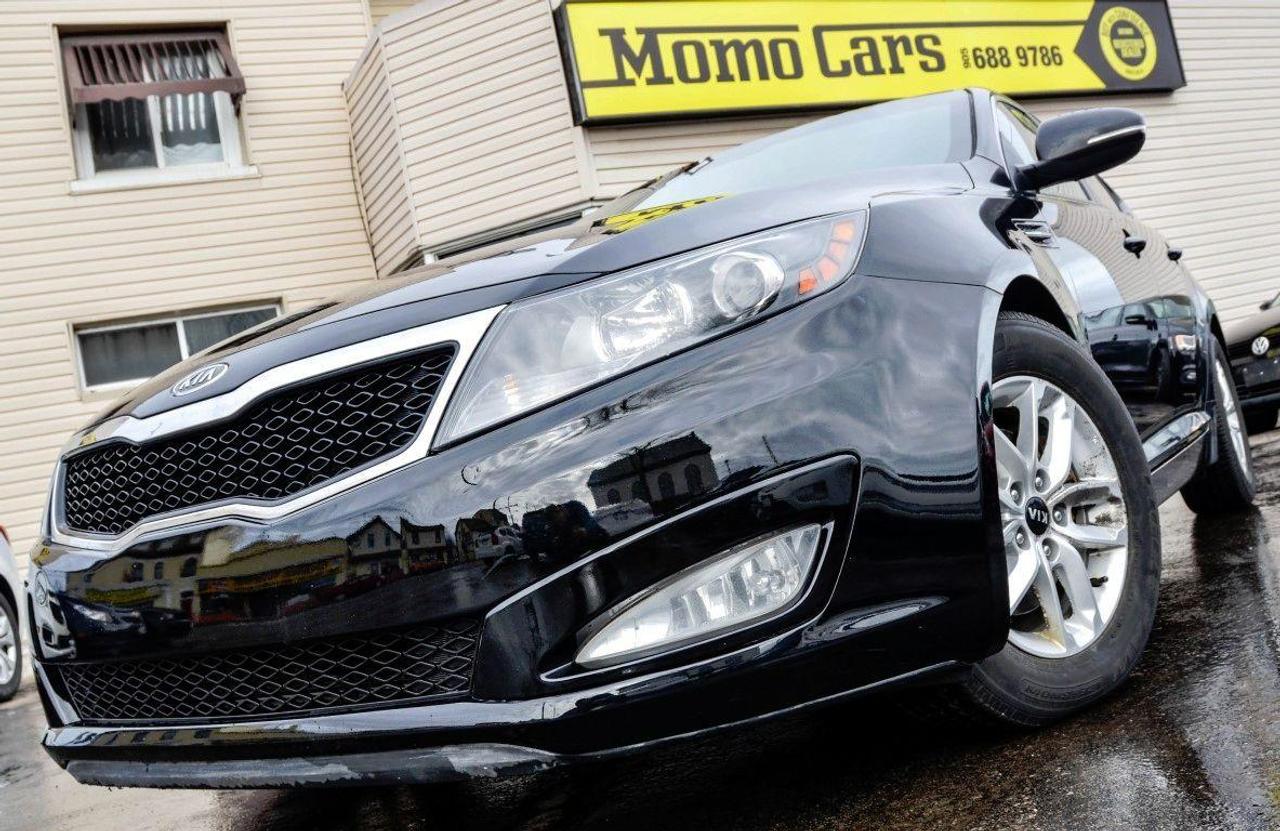 2012 Kia Optima GDI!

2.4L Inline 4 Cylinder Engine! FWD + Heated Seats + Cruise Control + Voice Recognition + Bluetooth + USB/Auxiliary Inputs + Steering Wheel Controls + Sirius Satellite Ready + Tinted Windows + Keyless Entry and so much more! 

Meet Kristy! The newest member of the Momo Family! Optima is at the forefront of midsize design: sleek and muscular, with none of the odd feel that sometimes characterizes new Asian cars. It is a car of finesse, with distinguished aesthetics. Inside, the interior appointments and materials are handsome, generous, and of high quality, overall. Beautiful leather adorns the dashboard and seating, comfortable with firm support, including the rear. The design and layout of the instrumentation reflect thought and employ the latest technology. Legible, jewel-like instruments signal that this is no bland commuter module, though the Optima does make a good commuter module. The expected conveniences are all there and will definitely make long trips easy! This car is truly one of a kind and we know that you?ll appreciate the time that went into the design! Call one of our Sales Professionals and let?s get the conversation started!  

We believe in full disclosure and just wanted to let you know the Kia has former insurance claims of $5,576.04 from 2012-10-24 & $1,536 from 2014-07-23. Now back to the Optima!

Here are two awesome facts that you want to know:

1) GDI injects highly-pressurized fuel directly into the cylinders during the engine?s combustion cycle. The result is an increased quality of combustion and efficiency. By making smarter use of fuel, GDI also reduces emissions. What the driver experiences is still the most critical element of any powertrain technology. And with GDI, the driver enjoys smooth, powerful acceleration and a longer time between refueling.

2) Safety features include dual front advanced airbags, front side airbags, side curtain airbags, side-impact door beams, front/rear crumple zones, impact-absorbing steering column, three-point seatbelts, front seatbelt pretensioners, adjustable front seatbelt anchors, child safety locks, child seat anchors, emergency trunk release, four-wheel power anti-lock disc brakes (ABS), brake assist, traction control (TCS), electronic stability control (ESC), hill-start assist (HAC), and the mandated tire-pressure monitor.

Fuel Economy: You can drive 50km for approx. $2.69! Rated at 6.92L/100km. Toronto from Niagara for $6.04!

Did You Know?  KIA is one of the largest sponsors of many excellent sports events. The most famous of them are the FIFA World Cup (World Football Championship) and the UEFA Championship (European Football Championship).

Finance Kristy Today! ONLY $99.96 Bi-Weekly! With $1,000 down on a 5 year term @ 4.99%! (Sale Price: $9,845 & Cost of borrowing $1,844.02) For well-qualified buyers. Whether youve got perfect credit or blemished we can do it all at Momo Cars! Inquire further as to your specific situation! 

To fill out our online CREDIT APPLICATION please visit:
www.momocars.ca/financing

Financing available for any and every situation. LOW INCOME, BANKRUPTCY, COLLECTIONS AND EVEN O.D.S.P.! We can do it all! From amazing prime rates to subprime! Youll be amazed at the Momo Difference! Dont hesitate to get a risk-free pre-approval today! Vehicle Repossession? Low Income? Student? Newly arrived to Canada? We can do it all! Down Payment May Be Required!

Call: 905-688-9786
Email: info@momocars.ca
Text: 289-407-2838

Momo Cars Inc
www.MomoCars.ca

Located in Downtown St Catharines. We are a trusted member of the UCDA and licensed by OMVIC. Buy with confidence!

35 Minute Drive from Hamilton & Burlington. 60 Minute Drive from Toronto & Mississauga.