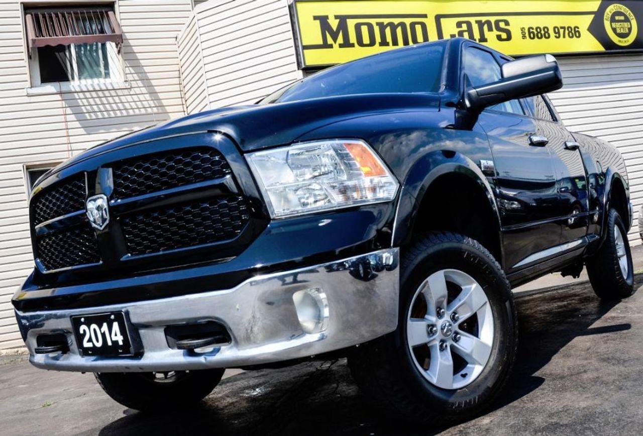 2014 RAM 1500 SLT Outdoorsman Quad Cab!

Dodge?s powerful V8 5.7L HEMI Engine! 4X4! Factory Lift-Kit + Tow Assist + Boxliner + Heated Mirrors + Bluetooth + Sirius Satellite Ready + Steering Wheel Controls + USB/Auxiliary Inputs + Cruise Control + Voice Recognition and so much more!

Meet Reina! The newest truck to join the Momo Family! RAM Trucks? recently redesigned full-size pickup earned Motor Trend?s prestigious Truck of the Year award for the last 2 years running, its ample towing and hauling capacities and new more-friendly interior have been declared a huge hit with critics. Rams powerful Hemi 5.7-liter V8, with variable valve timing, is rated at 395 horsepower (up 5 thanks to electric steering assist) and delivers broad power with 407 pound-feet of torque. Match the engines power with the trucks clean aerodynamics and one result is that the Hemis Multiple Displacement System (MDS) operates more often, enhancing fuel efficiency. The MDS essentially shuts off half the engine when not needed to save gas, and Chrysler says the Ram can be run past 112km with the MDS active. The Ram 1500 is a conventional full-size pickup truck, but it differs in rear suspension and powertrains from all its competitors. Underneath, where for decades pickup trucks have had a live axle in back with leaf springs, the Rams rear axle is suspended by coil springs and it is located by four trailing links and a lateral Panhard bar. Basic front suspension design, steering and brake systems parallel other half-ton pickups. On the outside, Ram continues with imposing stature. Like many Dodge cars, the Rams front end has a forward tilt, but it remains very aerodynamic. You won?t want to miss your opportunity to bring home this beast! Call one of our Sales Professionals today and let?s get the conversation started! 

Here are three awesome facts that you want to know:

1) The BEST NEWS we can give is that the truck comes with a CLEAN Autocheck! This means no worrying about any previous accidents or insurance claims! 

2)  Safety features include dual front multi-stage, side impact and side curtain airbags, three-point belts in all seating positions with constant-force retractors, LATCH child-seat anchors, child-protection rear door locks, electronic stability control and traction control and four-wheel anti-lock brakes.

3) Ram Outdoorsman ($34,270-$41,745) adds a 32-gallon gas tank, smaller front air dam, gray painted bumpers and fender flares, auto-dimming inside and power heated outside mirrors with signals, two-tone paint, limited-slip differential with 3.92:1 axle ratio and skid plates on 4WD, LT265/70R17E all-terrain tires on painted aluminum wheels, tow hooks, 7-inch TFT configurable screen, rubber floor mats, illuminated visor mirrors, 8.4-inch Uconnect Access via Mobile, and remote start.

Fuel Economy: You can drive 50km for approx. $5.04! Rated at 11.2L/100km. Toronto from Niagara for $11.28!

Did You Know? The Dodge Ram isn?t a stranger to accolades, as it?s won numerous awards over the years. Recently, the truck was the winner of U.S. News & World Report?s award for the Best Full Size Truck for the Money. In fact, the Ram had also won the same award in 2014, proving the brand?s consistency.

Finance Reina Today! ONLY $191.89 Bi-Weekly! With $2,000 down, 6 year loan @ 4.99%! (Sale Price: $23,444 & Cost of borrowing $4,071.39) For well-qualified buyers. Whether youve got perfect credit or blemished we can do it all at Momo Cars! Inquire further as to your specific situation! 

To fill out our online CREDIT APPLICATION please visit:
www.momocars.ca/financing

Financing available for any and every situation. LOW INCOME, BANKRUPTCY, COLLECTIONS AND EVEN O.D.S.P.! We can do it all! From amazing prime rates to subprime! Youll be amazed at the Momo Difference! Dont hesitate to get a risk-free pre-approval today! Vehicle Repossession? Low Income? Student? Newly arrived to Canada? We can do it all! Down Payment May Be Required!

Call: 905-688-9786
Email: info@momocars.ca
Text: 289-407-2838

Momo Cars Inc
www.MomoCars.ca

Located in Downtown St Catharines. We are a trusted member of the UCDA and licensed by OMVIC. Buy with confidence!

35 Minute Drive from Hamilton & Burlington. 60 Minute Drive from Toronto & Mississauga.