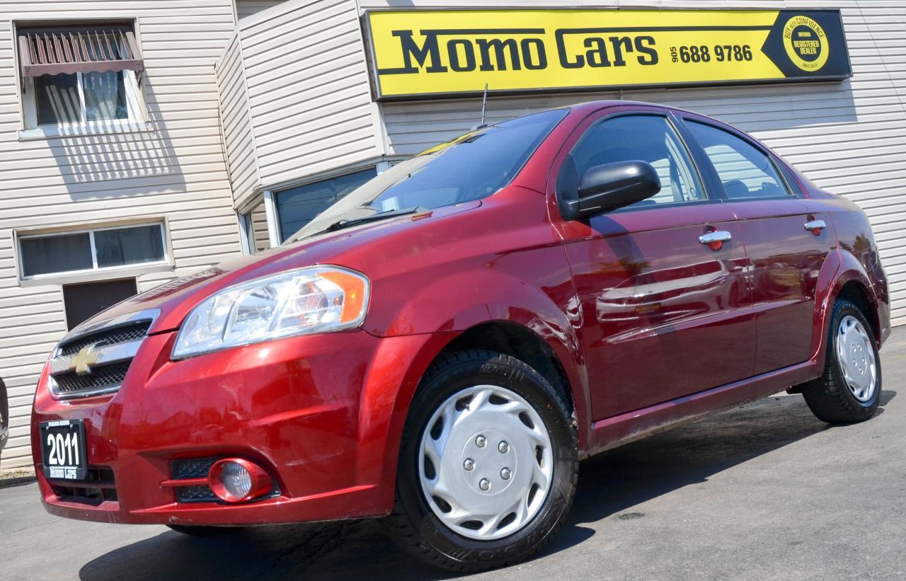 2011 Chevrolet Aveo 2LT!Only $102/Bi-weekly!

Chevy?s 1.6L Inline 4 Cylinder Engine! Low kilometers + Sunroof + AM/FM CD Player + Auxiliary Input + Tilt Steering Wheel and more!

Meet Victoria! The newest member of the Momo Family! Chevrolet redesigned the Cavalier several years ago, making it bigger and fancier so it could better compete with the Honda Civic. As a result, it needed a new entry-level model. That is the Aveo, which is built by the Korean automaker Daewoo. The Chevrolet Aveo is GMs smallest, least expensive car. Aside from its price, whats most attractive about the Chevy Aveo is its surprisingly handsome interior! Aveo was designed to offer sensible, day-to-day transportation. Its ride is tuned more for comfort than sporty driving. Comfort is important when commuting through heavy, stop-and-go traffic and the Aveo wont spill your coffee on the way to work. This car is perfect for a student on a budget or small family looking for that second vehicle! Call one of our Sales Professionals today and let us help you get into this fantastic vehicle! Victoria looks like it was babied to the maximum- the mileage on this beautiful sedan is fairly low for this model year. We believe in full disclosure and just wanted to let you know the Chevy Aveo has former insurance claims of $8206 on 2018-01-23. Now back to Victoria! 

Here are two awesome facts that you want to know:

1) Not only is the Aveo fun and comfortable to drive, but it is safe too! Safety features include dual-stage frontal and seat-mounted side air bags for the front seats, along with front-seat seat-belt pretensioners, which take slack out of the belt in a crash. 
2) This car is everything that you need if youre looking for great gas mileage and a low price.


Did You Know? If all the Chevrolets that were purchased in 2010 were to be lined bumper-bumper, they would cover 51% of the earth?s circumference.
Finance Victoria Today! ONLY  Bi-Weekly! With $1000 down, 4 year loan @ 4.99%! (Sale Price: $8444 & Cost of borrowing $1444.71) For well-qualified buyers. Whether youve got perfect credit or blemished we can do it all at Momo Cars! Inquire further as to your specific situation! 
To fill out our online CREDIT APPLICATION please visit:
www.momocars.ca/financing

Financing available for any and every situation. LOW INCOME, BANKRUPTCY, COLLECTIONS AND EVEN O.D.S.P.! We can do it all! From amazing prime rates to subprime! Youll be amazed at the Momo Difference! Dont hesitate to get a risk-free pre-approval today! Vehicle Repossession? Low Income? Student? Newly arrived to Canada? We can do it all! Down Payment May Be Required!

Call ahead to one of our experienced Sales Professionals as this one won?t last long!

Call: 905-688-9786
Email: info@momocars.ca
Text: 289-407-2838

Momo Cars Inc
www.MomoCars.ca

Located in Downtown St Catharines. We are a trusted member of the UCDA and licensed by OMVIC. Buy with confidence!

35 Minute Drive from Hamilton & Burlington. 60 Minute Drive from Toronto & Mississauga.