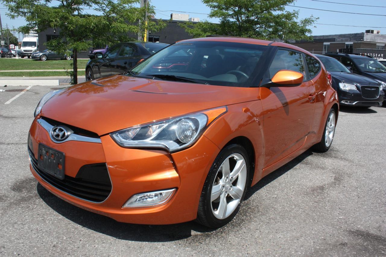 THIS 2013 HYUNDAI VELOSTER COMES IN ORANGE, WITH FULL POWER GROUP OPTIONS AND EXTRAS. SUNROOF, BACKUP CAMERA, BLUETOOTH, XM RADIO, PUSH START AND MUCH MUCH MORE. THIS VEHICLE COMES FULLY CERTIFIED, E-TEST AND ADMIN FEES ALL INCLUDED IN THE PRICE, FOR MORE INFO PLEASE CONTACT US AT 1855-350-1313 AT AA Canada INC. all of our vehicles come with a Safety Standard Certificate, Emission test plus HST. CARPROOF will be provided at the dealership ALL TRADE INS WELCOME. We also provide warranty packages and financing rates starting at 4.5% all credits types GOOD OR BAD CREDIT! Interested? We are here to serve you, call us at Toll free 1-855-350-1313 or 647-350-1313 email us at aacanadainc@gmail.com or visit us online at www.aacanadainc.com