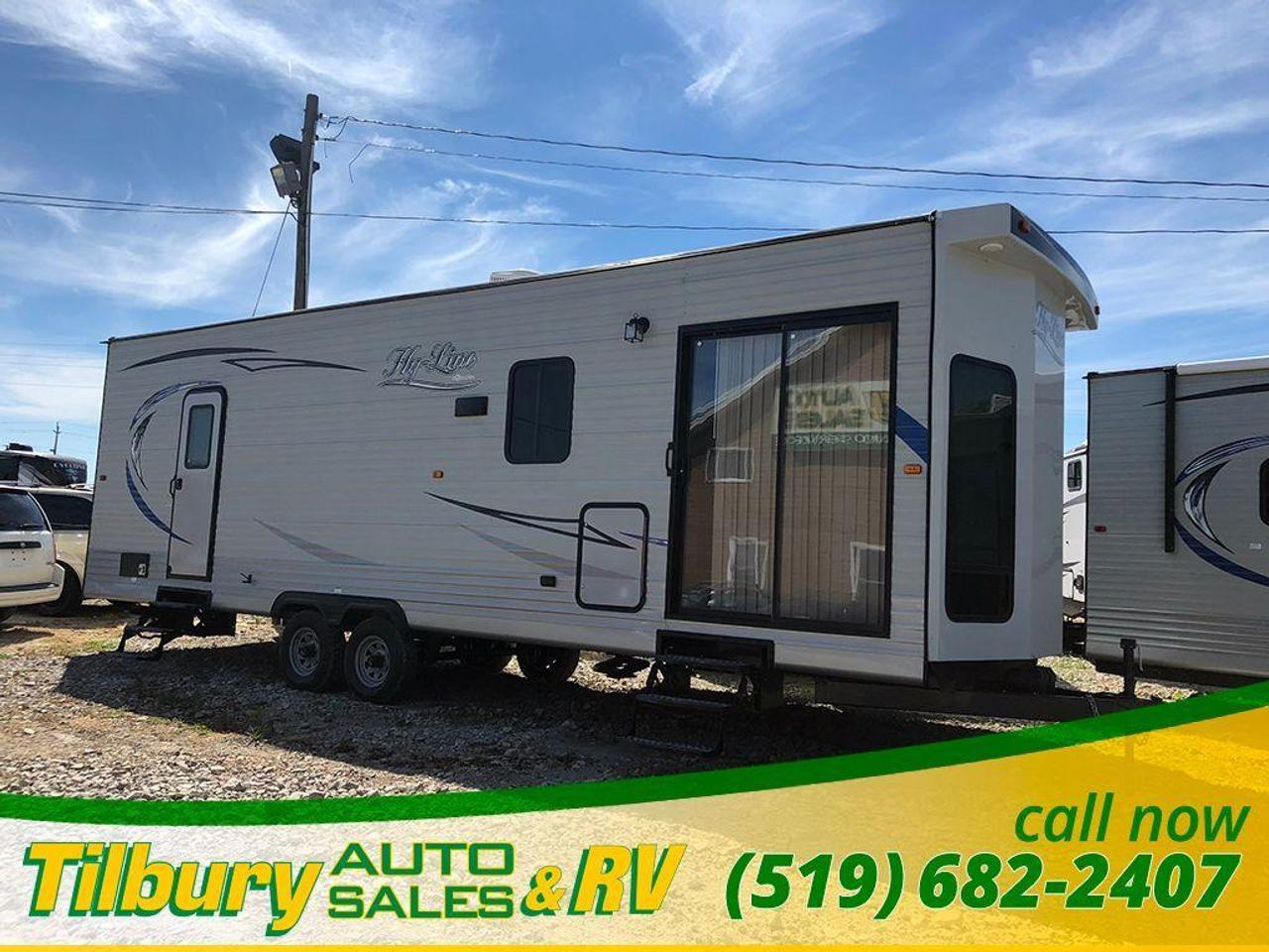 <p class=MsoNormal><span style=font-size: medium;><strong><span style=font-family: Verdana,sans-serif; mso-bidi-font-family: Arial; background: white;>Call us at 519-682-2407 or visit our lot at 20600 HWY #42, Tilbury, Ontario. Canada. + prep charges&nbsp;<br /><br /></span></strong><span style=font-family: Verdana,sans-serif; mso-bidi-font-family: Arial; background: white;>HyLine HY32 FLSB park model trailer. Very functional unit.&nbsp;<br />Walk in and notice the gorgeous entertainment centre located at the back of the unit with an eletric fireplace. Skip the dinette this time replaced with residental kitchen table and chairs. Chairs can flip up and small things can be stored underneath the cushion (paper work, etc)&nbsp;<br /><br />4 burner stove! Double sink with covers for additional counter space. BIG full sized fridge/freezer. Lots of cupboard space to store everything you may possibily need. Beautiful red leather couch with decorative pillows. Can be folded out to make an additional sleeping space. Very comfortable unit with lots of windows.<br /><br />At the front of the park model, there is a bedroom. The bedroom has 2 doors, one leading into the bathroom and one into the hallway of the RV. Overhead storage in the bedroom and of course, storage under the bed.&nbsp;<br /><br />Full 3 piece bathroom including a vanity. Lots of room to stand up and move around in this shower. This would be a perfect addition to an RV park.&nbsp;</span></span></p>
<p class=MsoNormal><span style=font-size: medium;><strong><span style=font-family: Verdana, sans-serif; background-image: initial; background-position: initial; background-size: initial; background-repeat: initial; background-attachment: initial; background-origin: initial; background-clip: initial;>Call us at 519-682-2407 or visit our lot at 20600 HWY #42, Tilbury, Ontario. Canada. + prep charges&nbsp;</span></strong></span></p>
<p class=MsoNormal><strong><span style=font-size: 7.5pt; line-height: 115%; font-family: Arial,sans-serif; background: white; font-weight: normal;>While every reasonable effort is made to ensure the accuracy of this data, we are not responsible for any errors or omissions contained on these pages. Please verify any information in question with a dealership sales representative. Serving, Windsor, Essex, Tilbury, Chatham, Blenheim, Rodney, St. Marys, St. Thomas, Leamington, Harrow, Amherstburg, Kingsville, Wheatley, Belle River, Lakeshore, Wallaceburg, Sarnia,London, Lambton, Lambton County, Lambeth, Essex County, Middlesex, Middlesex County, Rodney, Dresden, Thamesville, Lasalle, Watford, Ailsa Craig, Glencoe, Alvinston, Parkhill, Strathroy, Mt.Brydges, West Lorne, Dutton, Aylmer * Prices in Ontario, include OMVIC/AMVIC fee (where applicable), dealer administration and other retailer charges and exclude taxes, license, insurance, plus HST* * While every reasonable effort is made to ensure the accuracy of this information, we are not responsible for any errors or omissions contained on these pages. Please verify any information in question with Tilbury Auto Sales & RV.&nbsp;</span></strong></p>